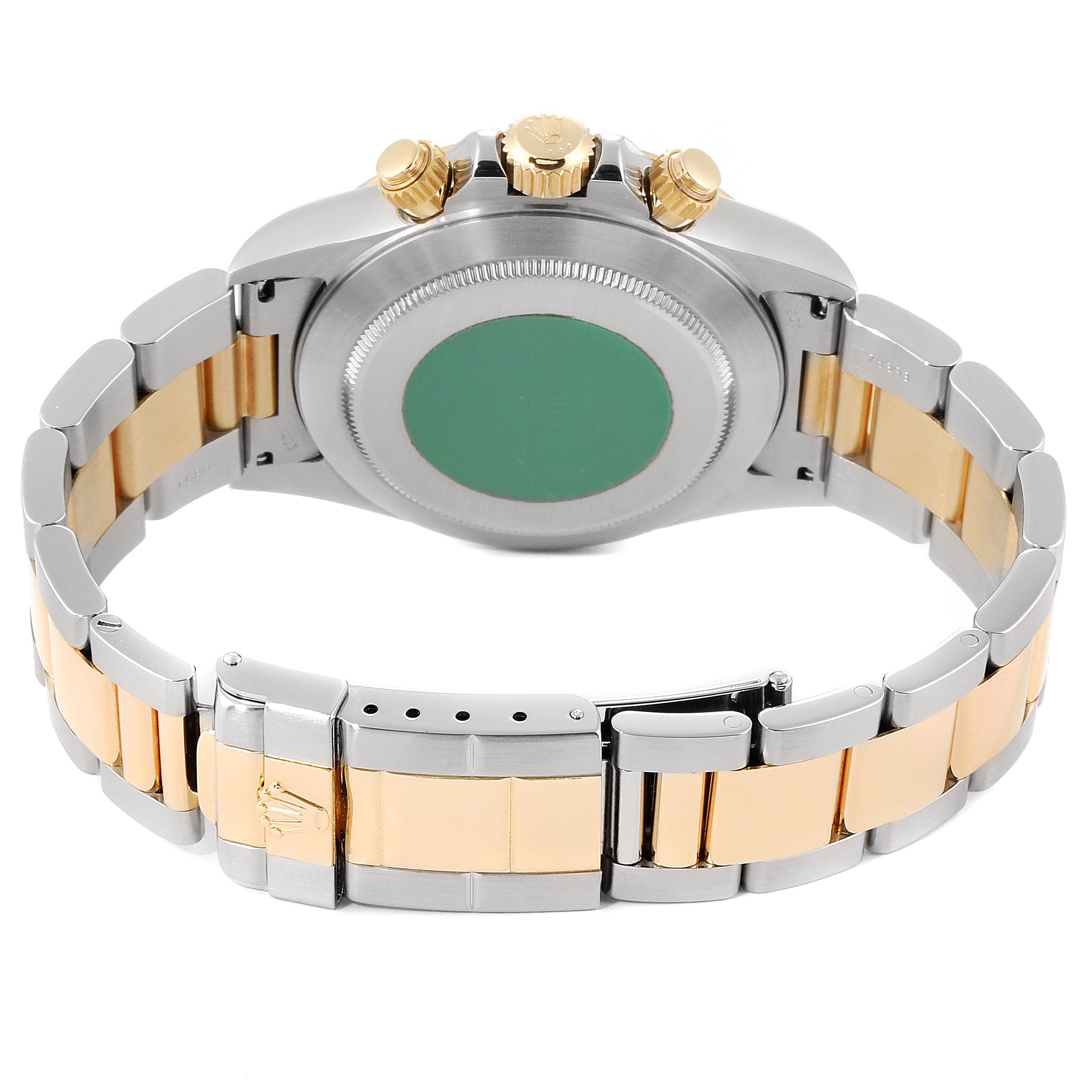 The image shows the back of a Rolex Daytona 16523 Men's Steel and Gold (two tone) Grey Dial 16523 Men's Steel and Gold (two tone) Grey Dial watch, highlighting the case, crown, and two-tone bracelet.