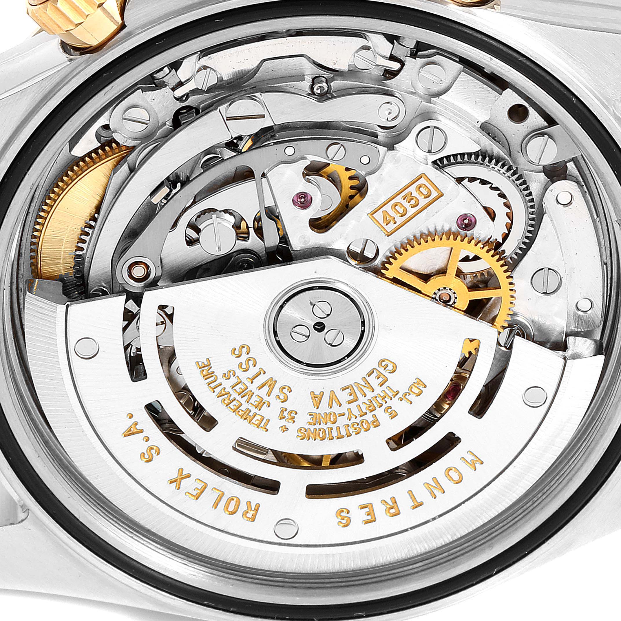 This image shows the internal mechanism and movement of a Rolex Daytona 16523 Men's Steel and Gold (two tone) Grey Dial 16523 Men's Steel and Gold (two tone) Grey Dial watch from a close-up, rear angle.