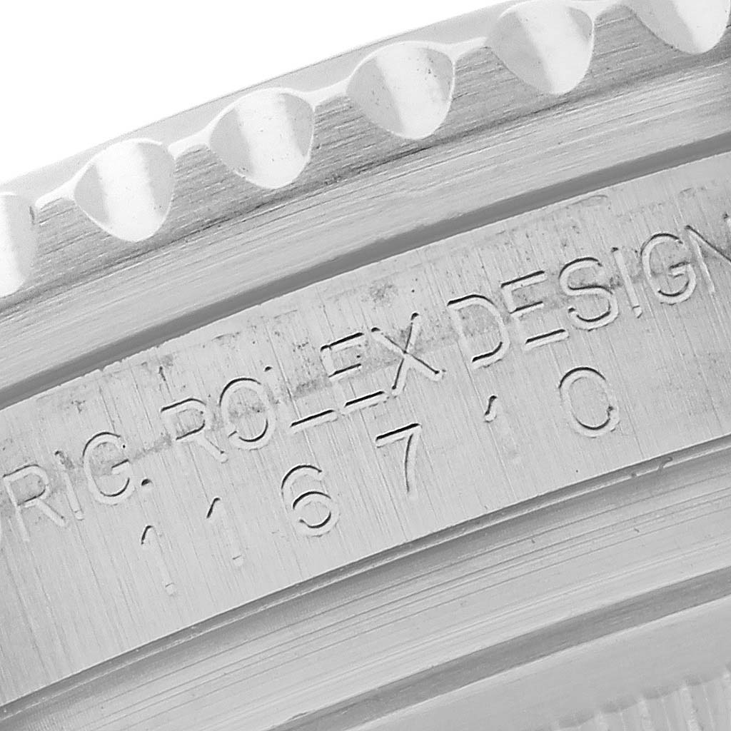 The image shows a close-up of the side of a Rolex GMT-Master 116710BLNR Men
s Stainless Steel Black Dial 116710BLNR Men
s Stainless Steel Black Dial, highlighting the engraved model number.