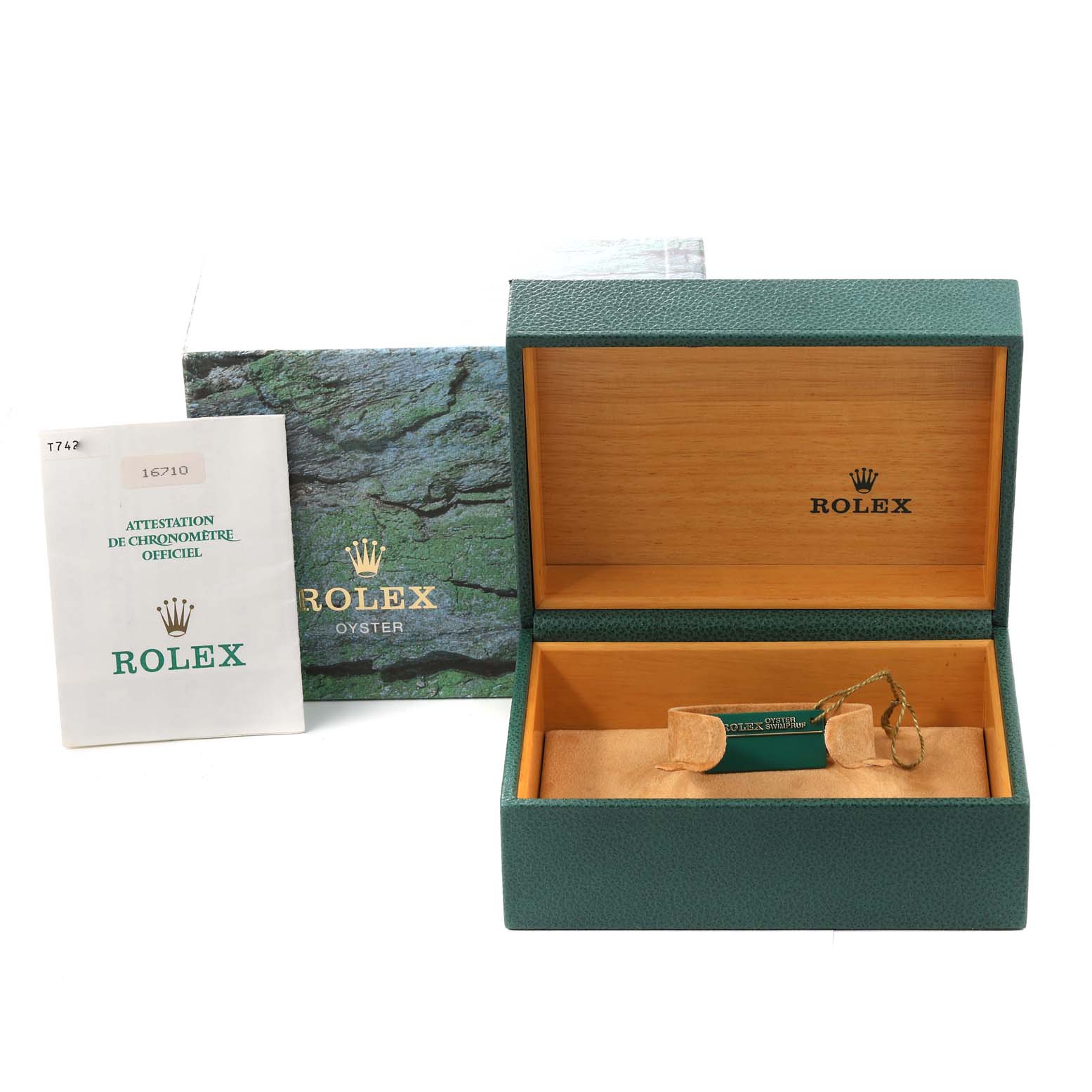 The image shows the packaging and documentation of a Rolex GMT-Master 16710 Men
s Stainless Steel Black Dial 16710 Men
s Stainless Steel Black Dial, including the green box, certificate, and tags.