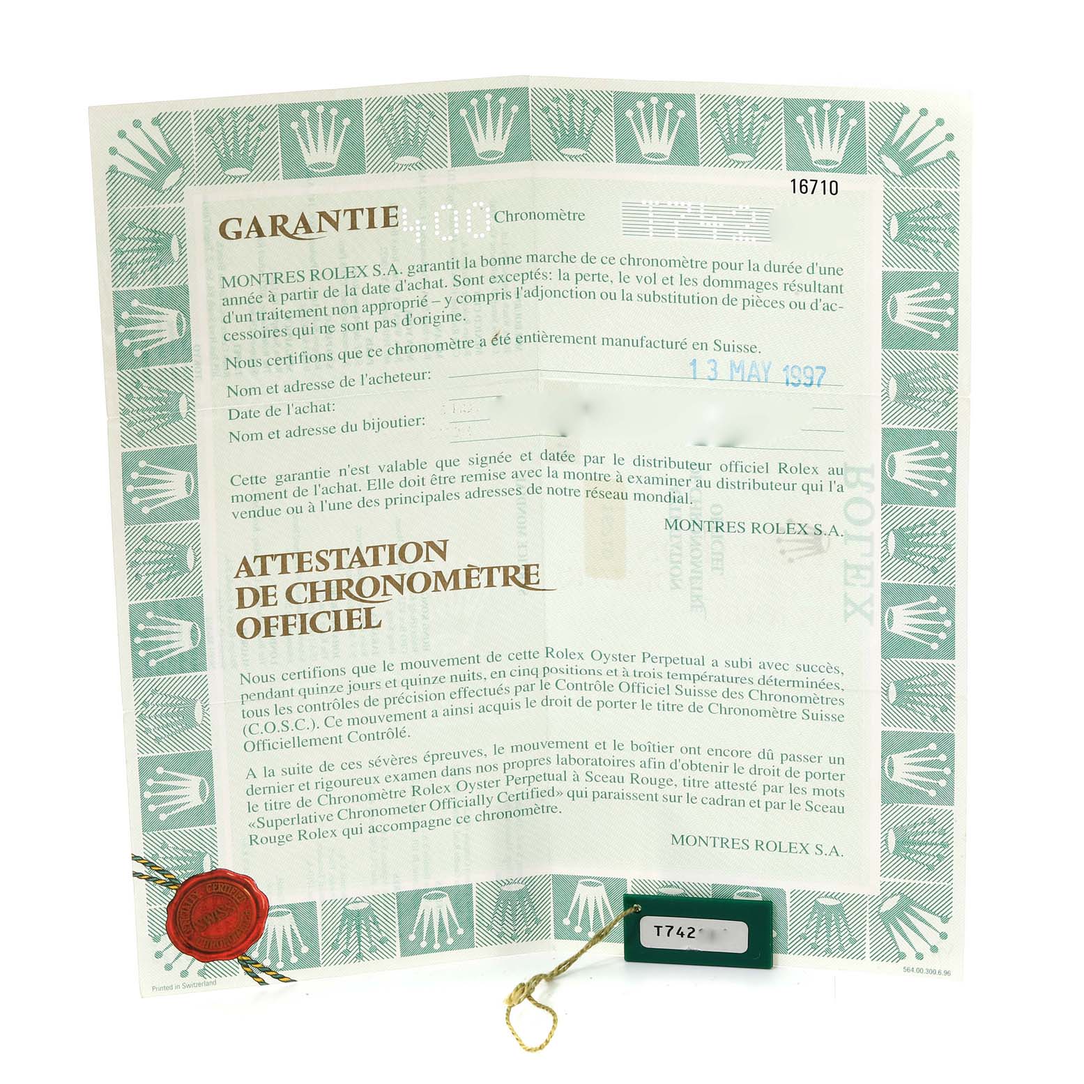 This image shows the warranty and official chronometer certification papers for a Rolex GMT-Master 16710 Men
s Stainless Steel Black Dial 16710 Men
s Stainless Steel Black Dial model.