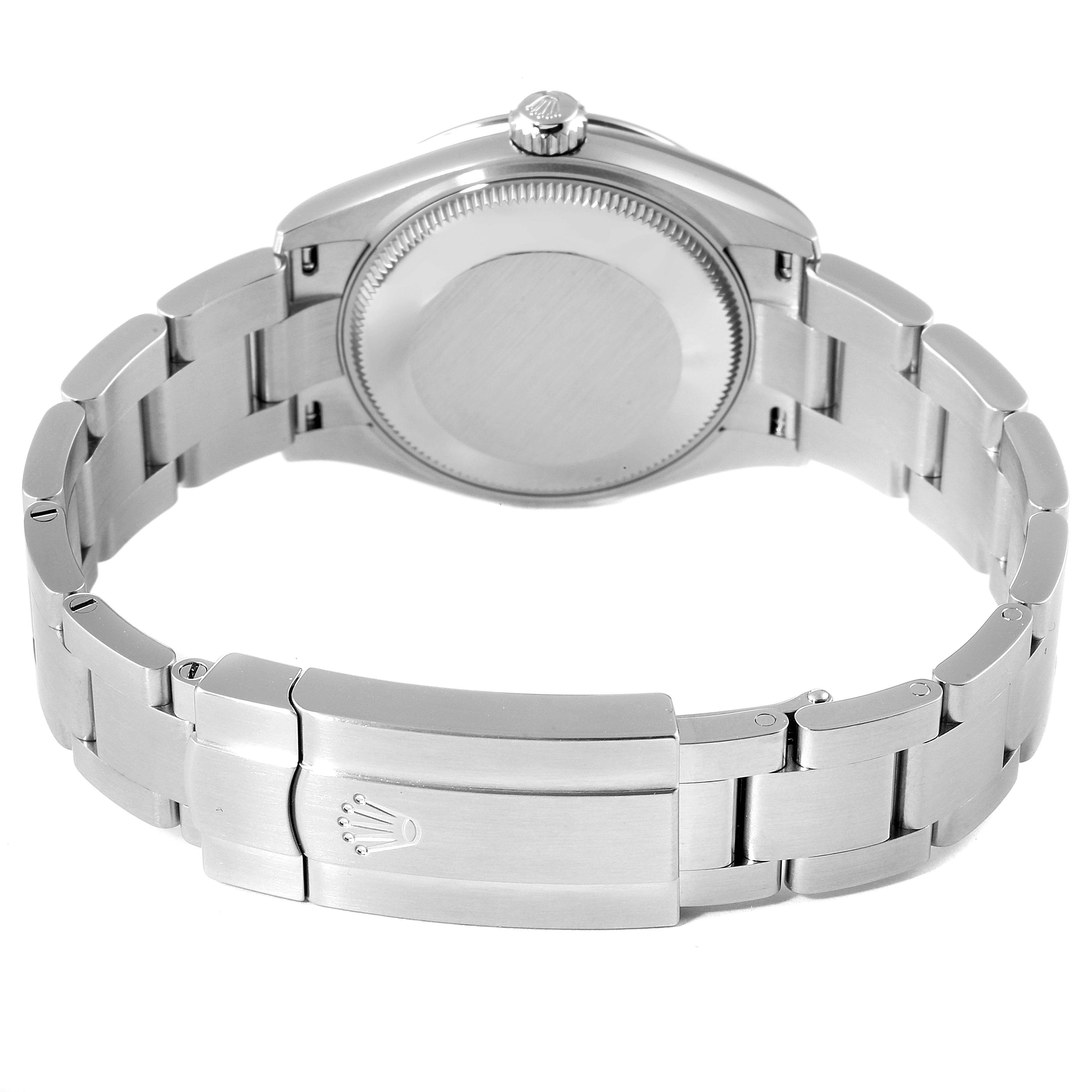 The image shows the back view of the Rolex Mid-Size 277200 Women's Stainless Steel Yellow Dial 277200 Women's Stainless Steel Yellow Dial model watch, highlighting its case back and bracelet.