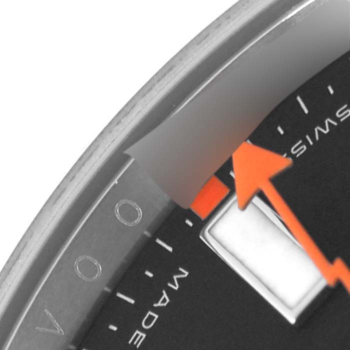 The image shows a close-up of the Rolex Milgauss 116400 Men's Stainless Steel Black Dial 116400 Men's Stainless Steel Black Dial watch face, highlighting the orange second hand and partial dial.