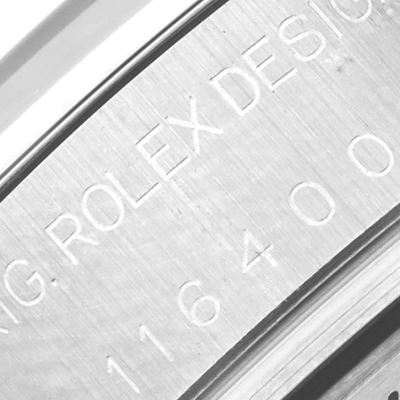 The image shows a close-up of the Rolex Milgauss 116400 Men's Stainless Steel Black Dial 116400 Men's Stainless Steel Black Dial model's inner casing with engraved text.