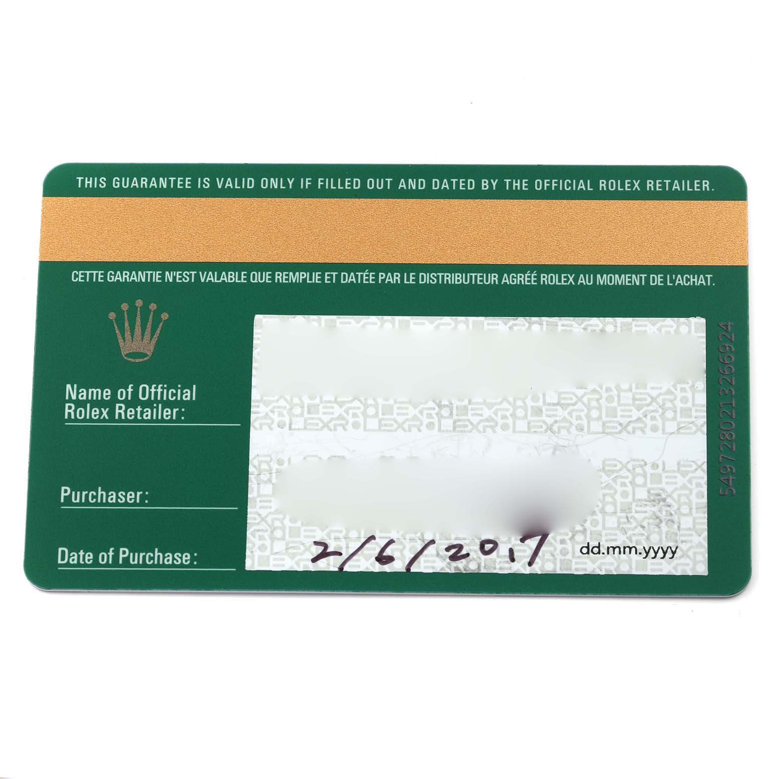 This image shows a green and gold warranty card for a Rolex Oyster Perpetual 114300 Men's Stainless Steel Blue Dial 114300 Men's Stainless Steel Blue Dial watch.