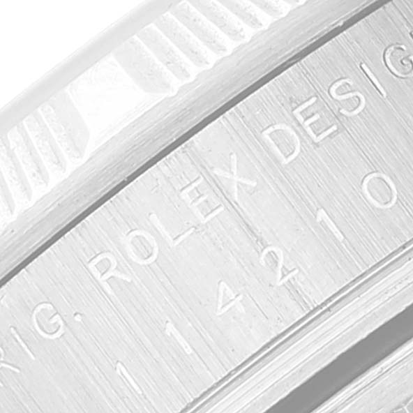 This is a close-up of the case side of the Rolex Air-King 114210 Men's Stainless Steel Grey Dial 114210 Men's Stainless Steel Grey Dial, showing the engraved model number and brand name.