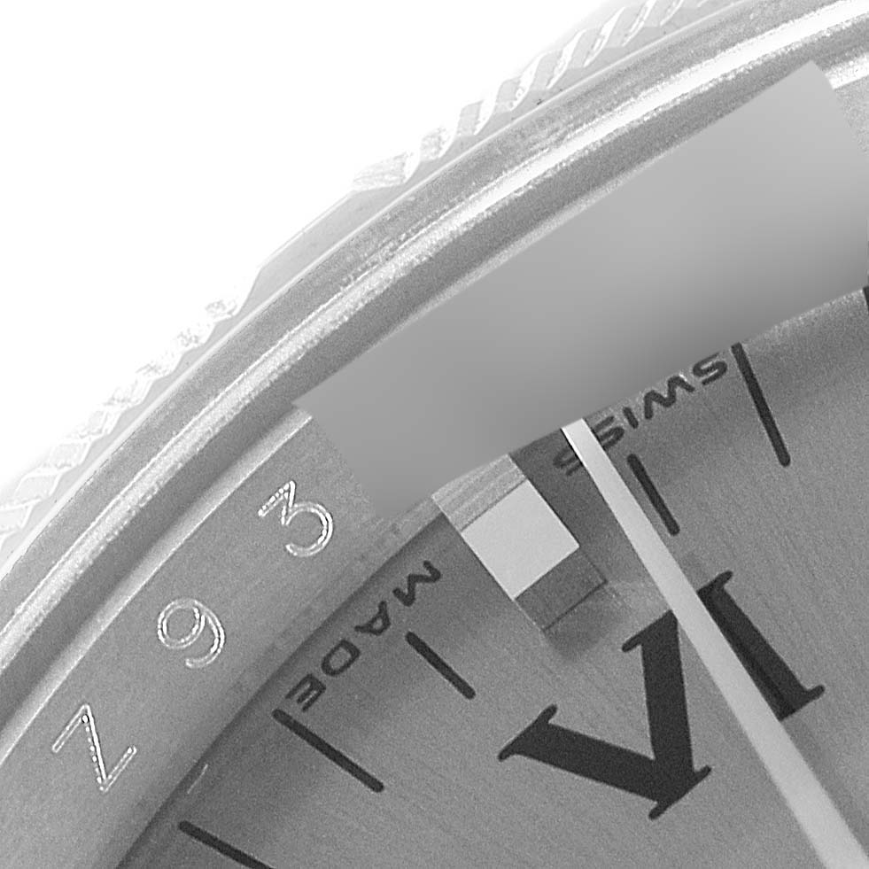 Close-up of the Rolex Air-King 114210 Men's Stainless Steel Grey Dial 114210 Men's Stainless Steel Grey Dial watch face, showing part of the dial with the number VI and the "SWISS MADE" text.