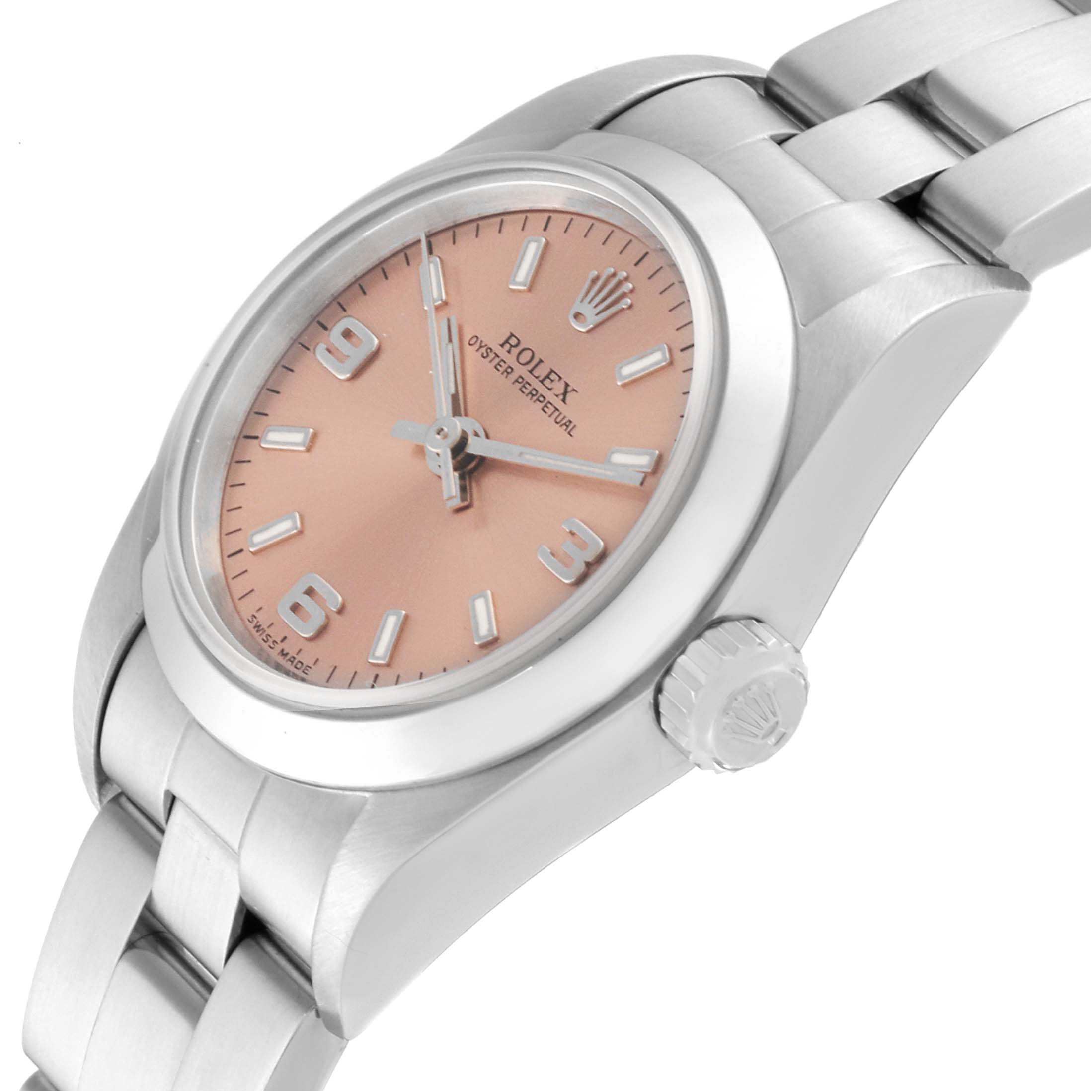 The Rolex Oyster Perpetual 76080 Women's Stainless Steel Pink Dial 76080 Women's Stainless Steel Pink Dial watch is shown at a slight angle, displaying the dial, case, bezel, bracelet, and crown.