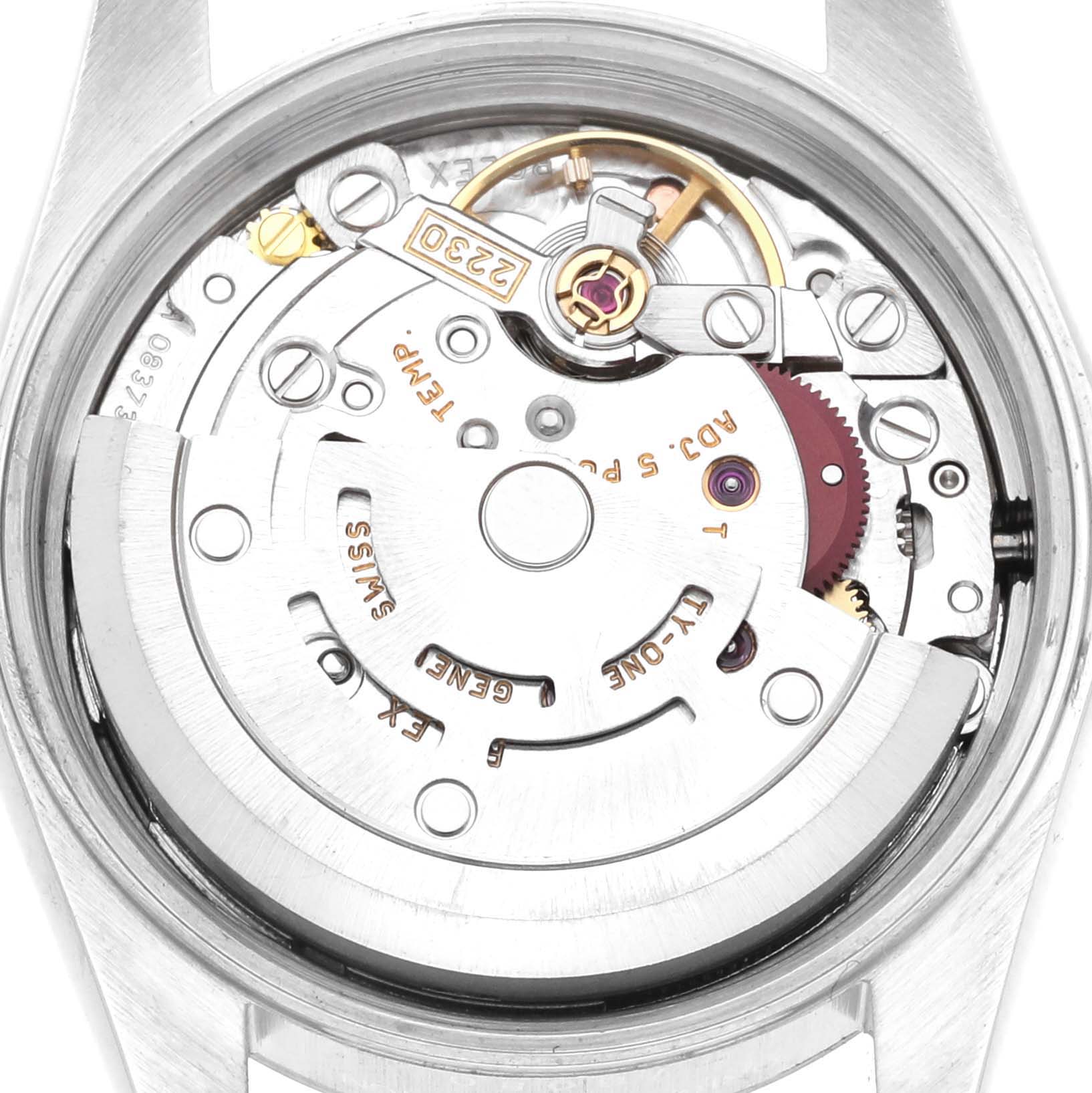 The image shows the Rolex Oyster Perpetual 76080 Women's Stainless Steel Pink Dial 76080 Women's Stainless Steel Pink Dial's movement from a top-down angle, highlighting its internal mechanism.