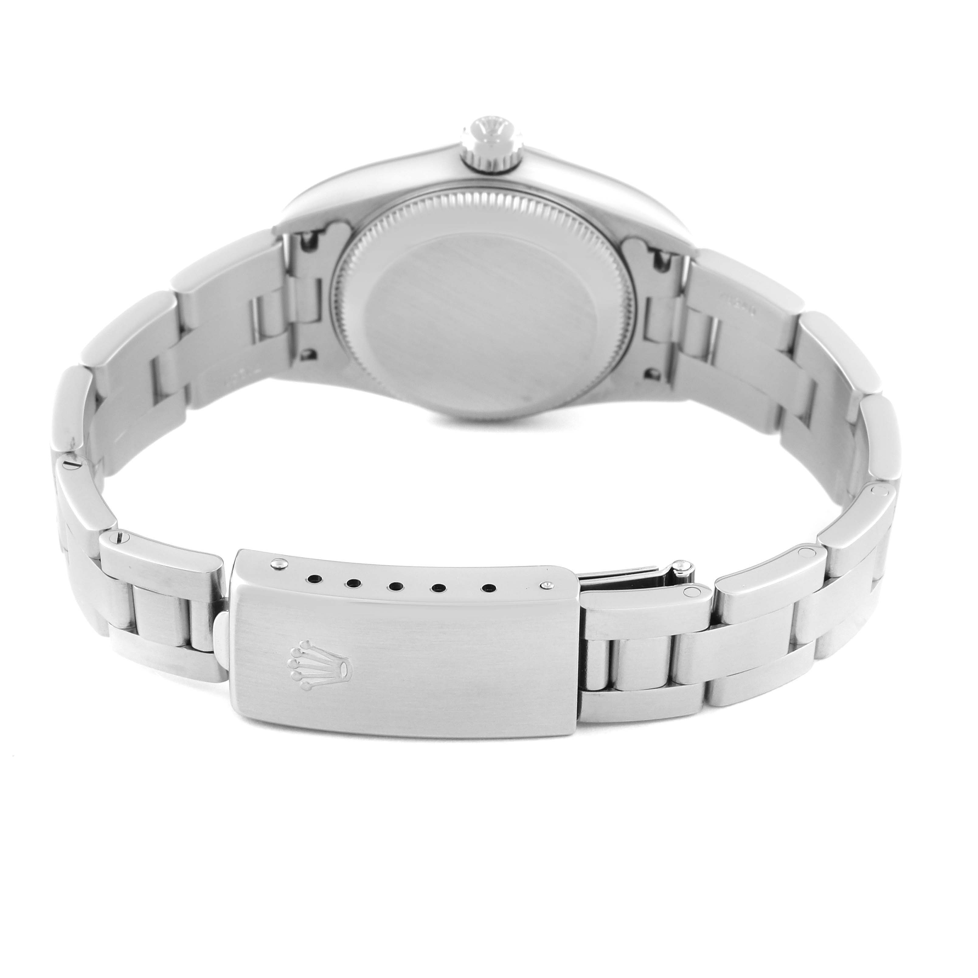 The image shows a rear view of the Rolex Oyster Perpetual 76080 Women's Stainless Steel Pink Dial 76080 Women's Stainless Steel Pink Dial, focusing on the closed clasp and bracelet.