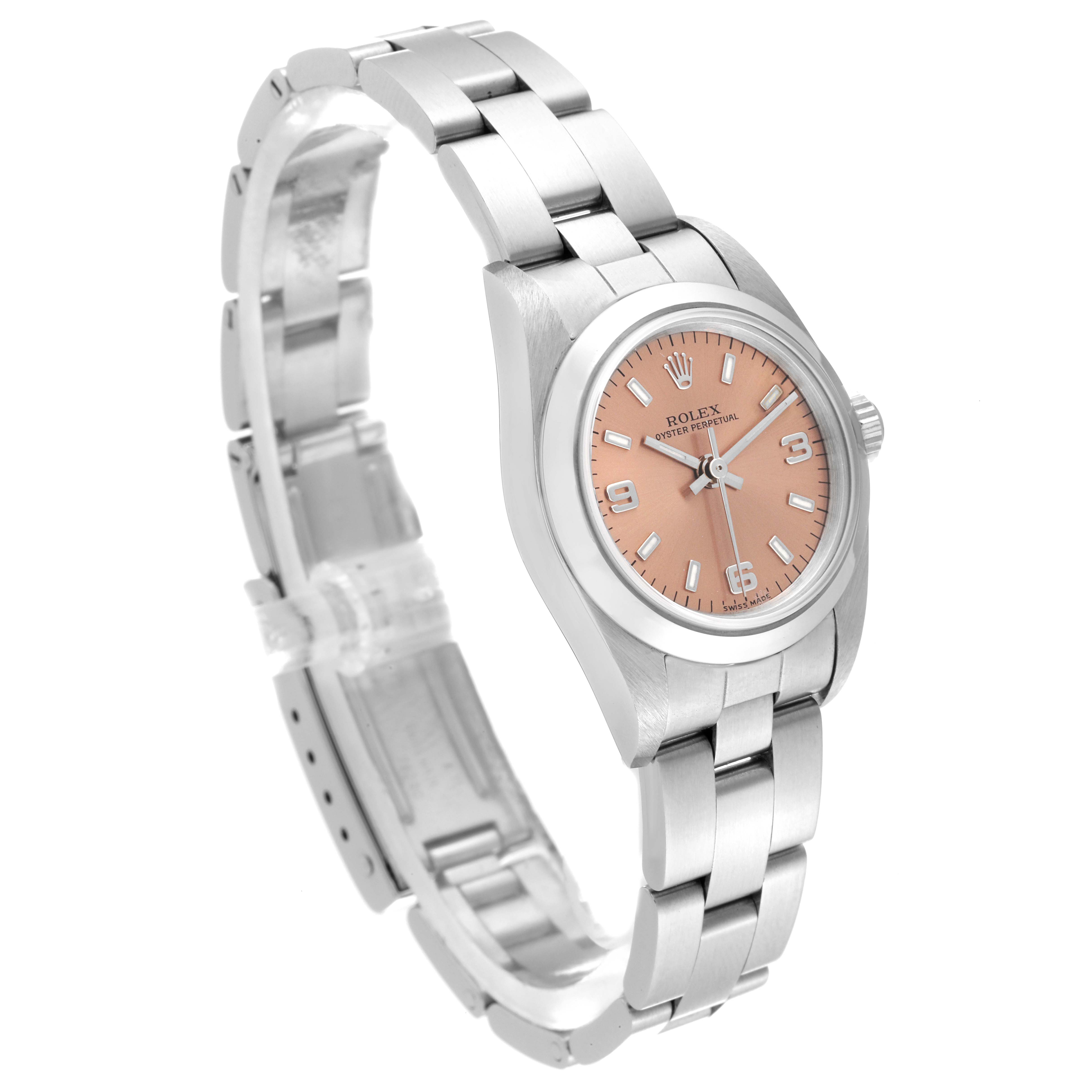 The Rolex Oyster Perpetual 76080 Women's Stainless Steel Pink Dial 76080 Women's Stainless Steel Pink Dial watch is shown at a three-quarter angle, displaying the bracelet and pink dial.