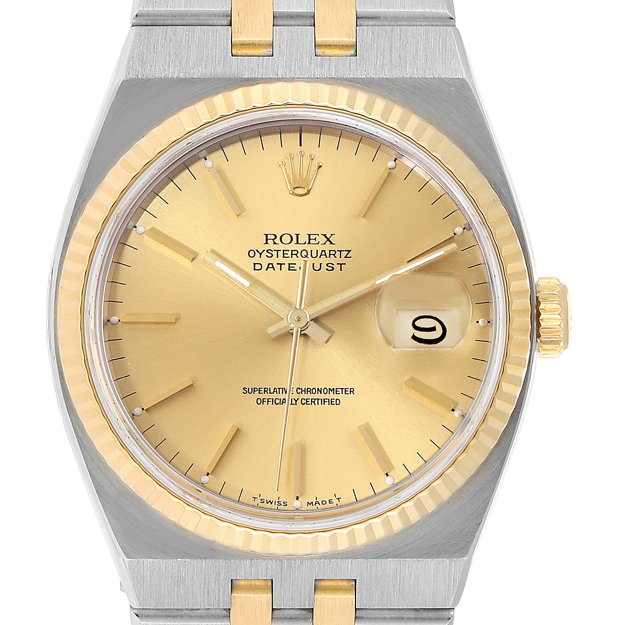 This image shows a front view of the Rolex Oysterquartz 17013 Men's Steel and Gold (two tone) Champagne Dial 17013 Men's Steel and Gold (two tone) Champagne Dial Datejust watch, displaying its dial, hands, date window, and part of the bracelet.