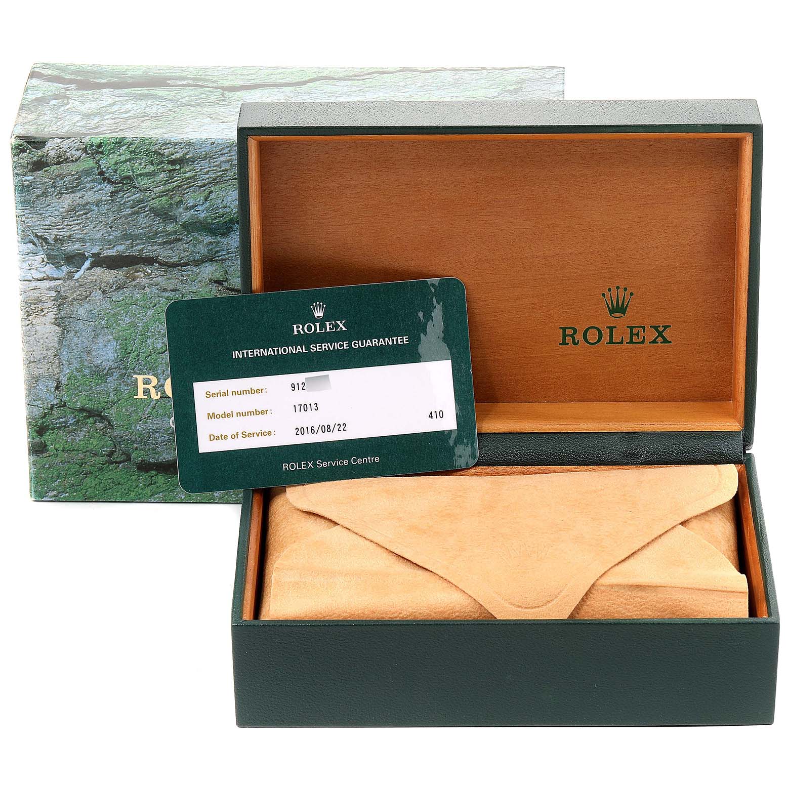 The image shows the Rolex Oysterquartz 17013 Men's Steel and Gold (two tone) Champagne Dial 17013 Men's Steel and Gold (two tone) Champagne Dial packaging, including the box, suede pouch, and an international service guarantee card.