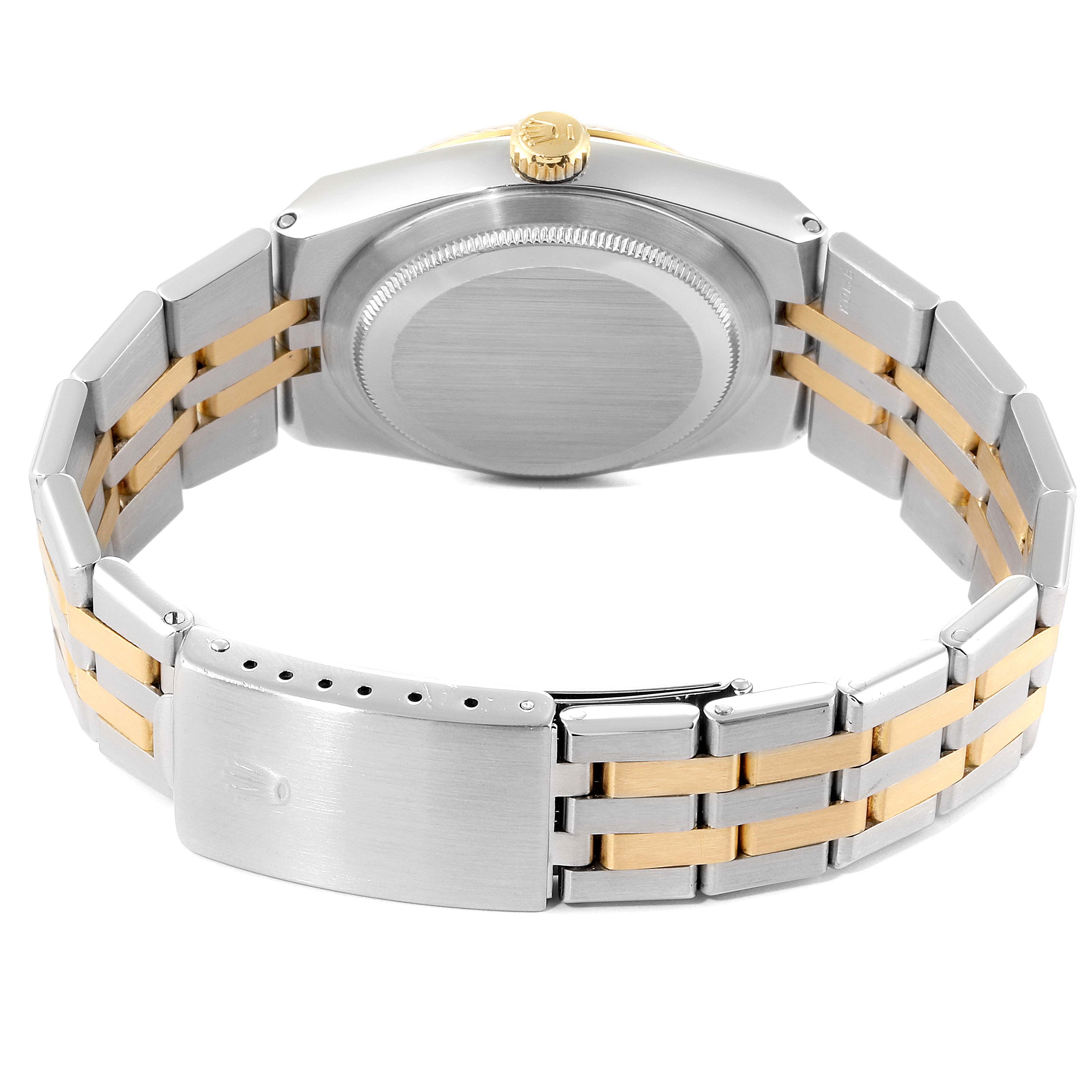 This image shows the back view of a Rolex Oysterquartz 17013 Men's Steel and Gold (two tone) Champagne Dial 17013 Men's Steel and Gold (two tone) Champagne Dial watch, featuring its caseback, bracelet, and clasp.