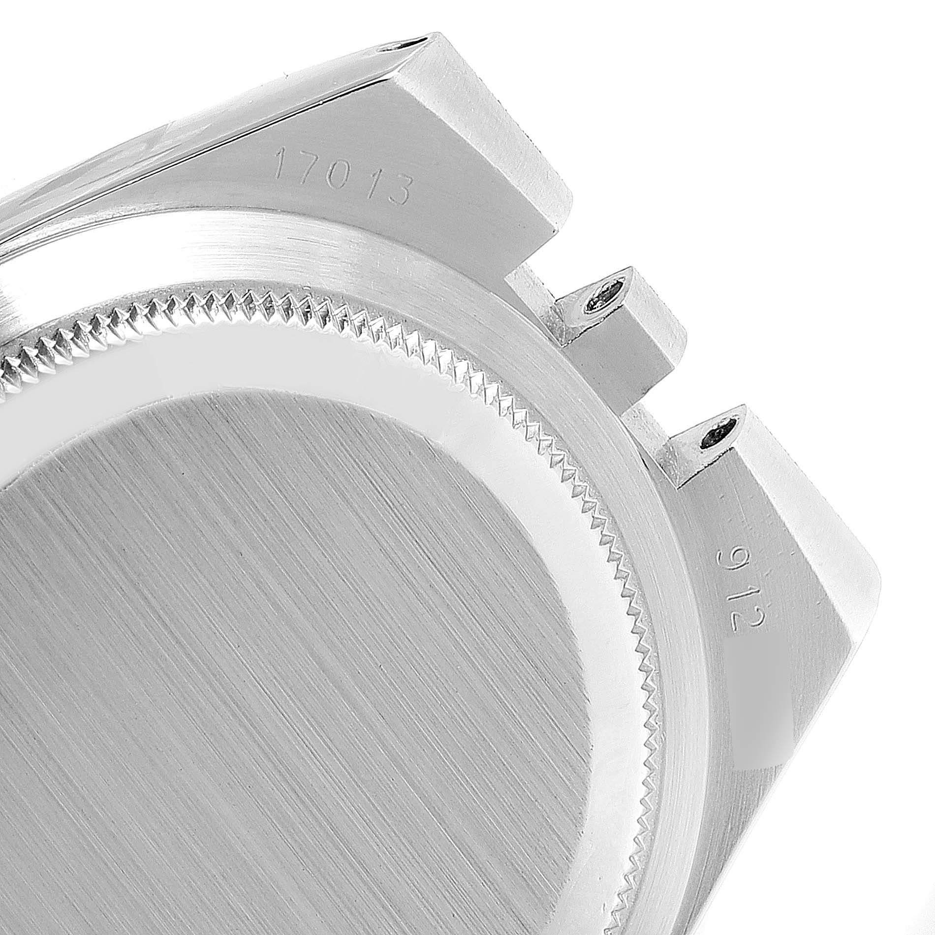 This image shows a close-up of the side and back case of a Rolex Oysterquartz 17013 Men's Steel and Gold (two tone) Champagne Dial 17013 Men's Steel and Gold (two tone) Champagne Dial model, highlighting the screw-down lugs and engraved model number.