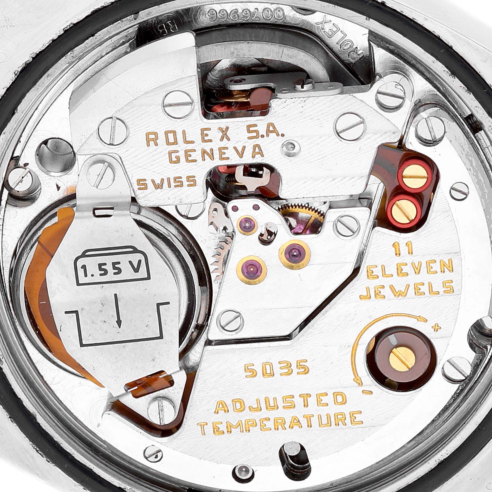 The image shows the movement and internal mechanism of a Rolex Oysterquartz 17014 Men
s Stainless Steel White Dial 17014 Men
s Stainless Steel White Dial watch model from a close-up, top-down angle.