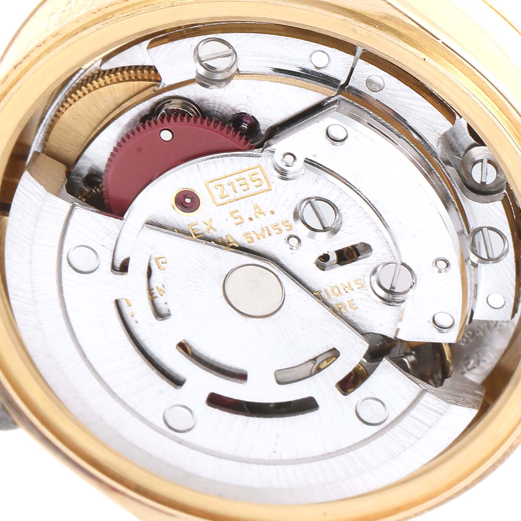 This image shows the inner mechanical movement of a Rolex President 69178 Women's Yellow Gold Champagne Dial 69178 Women's Yellow Gold Champagne Dial model watch, including gears and jewel bearings.