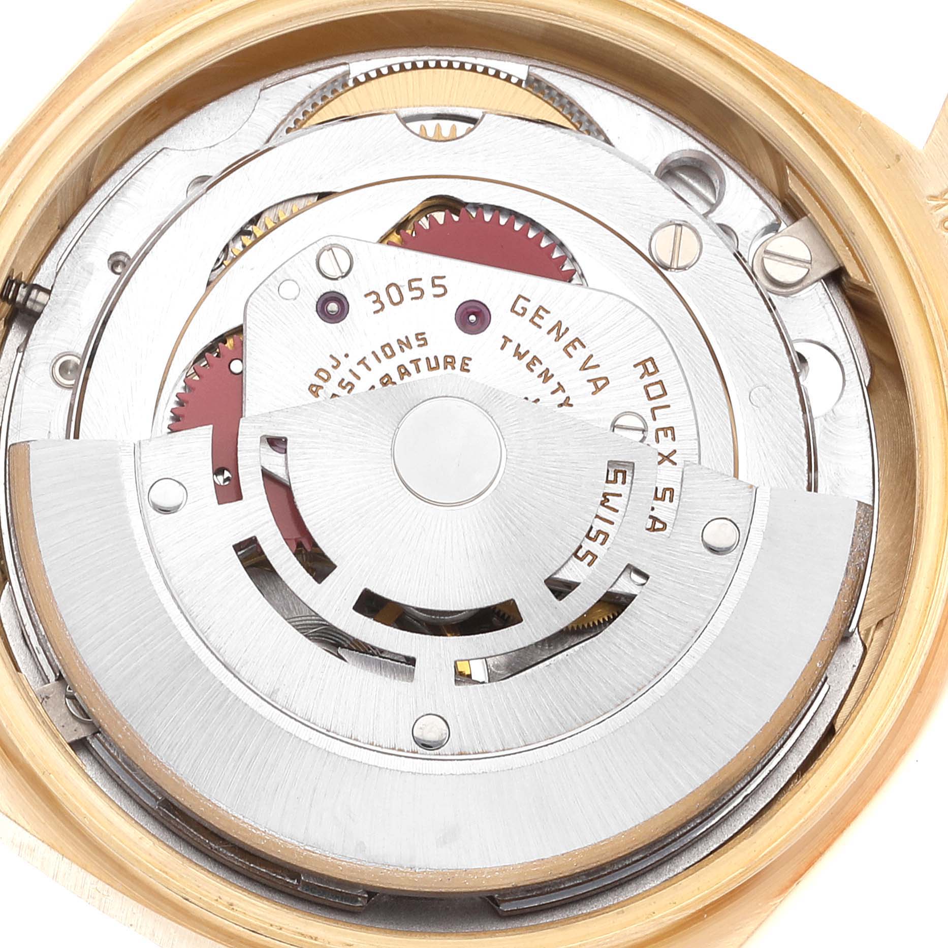The image shows the intricate inner mechanism of a Rolex President 18038 Men
s Yellow Gold Champagne Dial 18038 Men
s Yellow Gold Champagne Dial model watch from a close-up angle.