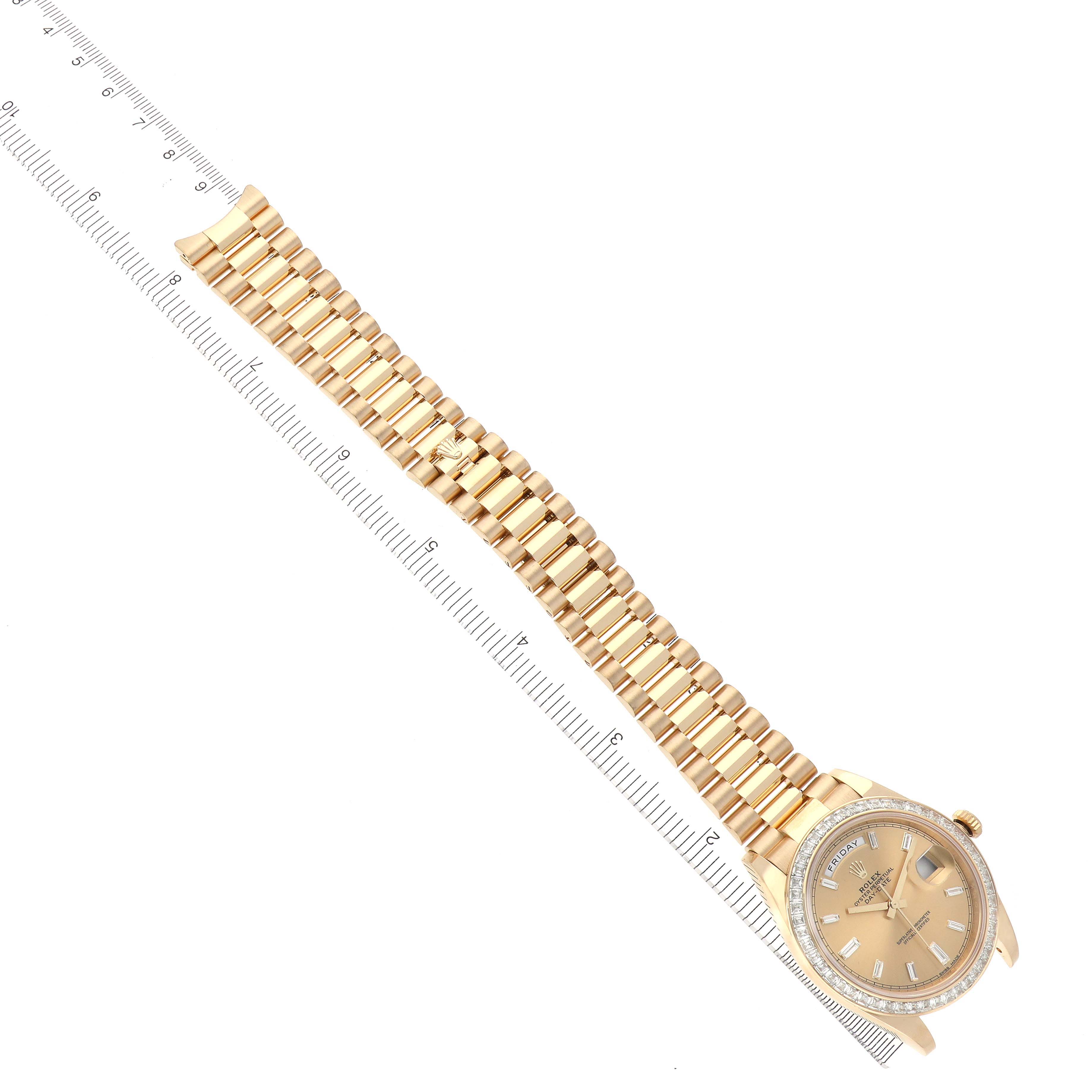 The Rolex President M228398TBR-0036 Men's Yellow Gold Champagne Dial M228398TBR-0036 Men's Yellow Gold Champagne Dial watch is shown diagonally, featuring the gold bracelet and diamond bezel from an overhead angle.