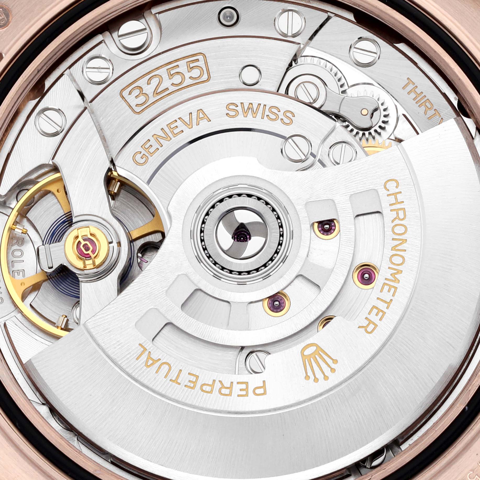 The image shows the intricate movement of a Rolex President 128235 Men
s Rose Gold Brown Dial 128235 Men
s Rose Gold Brown Dial model watch from the back.