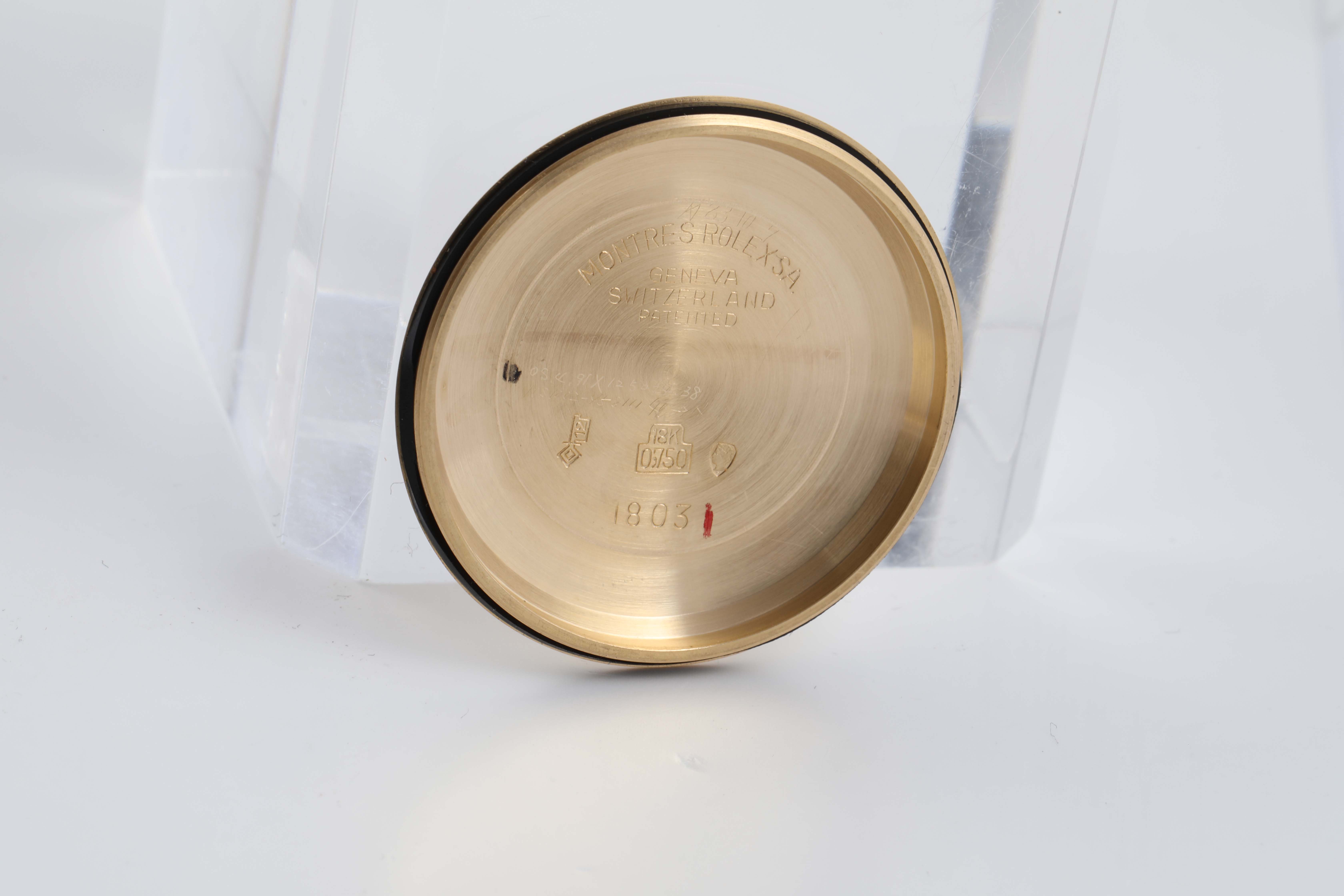 The image shows the inside case back of a Rolex President 1803 Men
s Yellow Gold Silver Dial 1803 Men
s Yellow Gold Silver Dial model watch, viewed from a top angle.