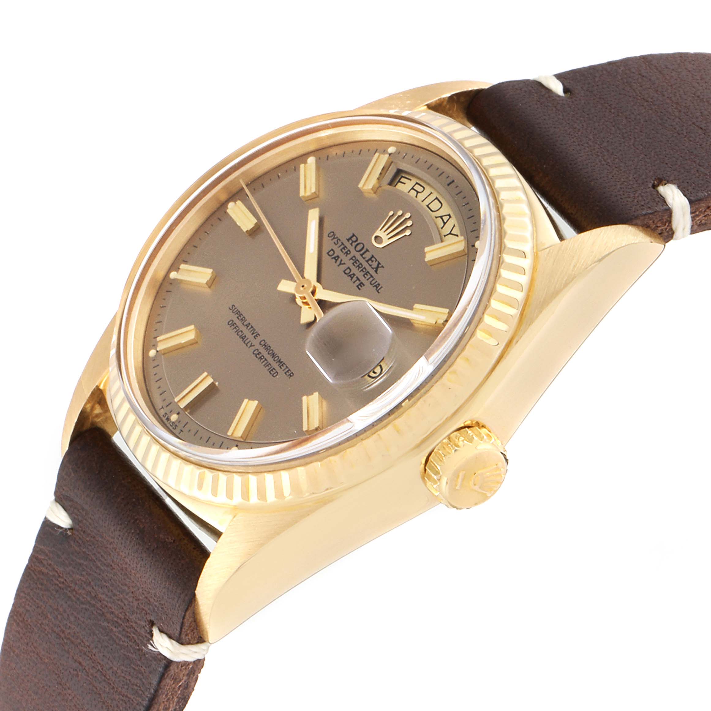 The image shows the Rolex President 1803 Men
s Yellow Gold Silver Dial 1803 Men
s Yellow Gold Silver Dial model watch at a close-up angle, highlighting the dial, crown, and part of the leather strap.