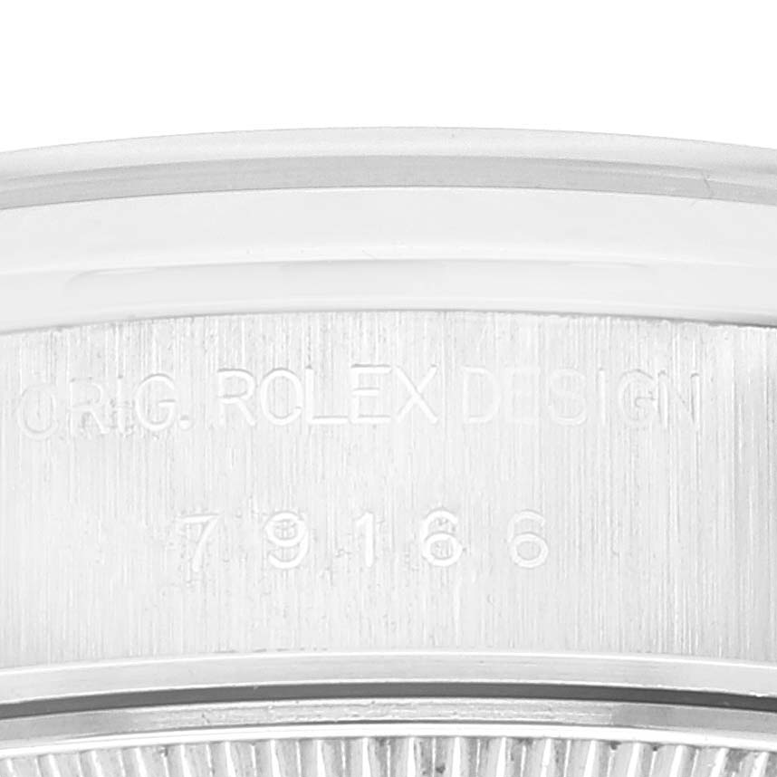 The image shows a close-up of the Rolex President 79166 Women's Platinum Silver Dial 79166 Women's Platinum Silver Dial watch's inner bezel with the model number engraved.