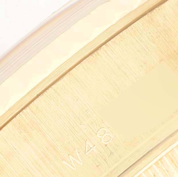 This image shows a close-up of the engraved inner bracelet link of a Rolex President 69178 Women
s Yellow Gold Champagne Dial 69178 Women
s Yellow Gold Champagne Dial model watch.