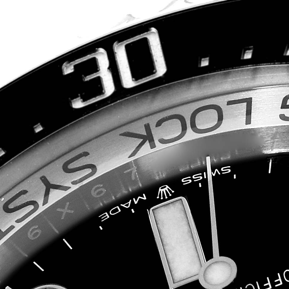 This close-up image of the Rolex Sea-Dweller 126660 Men's Stainless Steel Blue Dial 126660 Men's Stainless Steel Blue Dial shows part of the bezel, minute hand, and dial details.