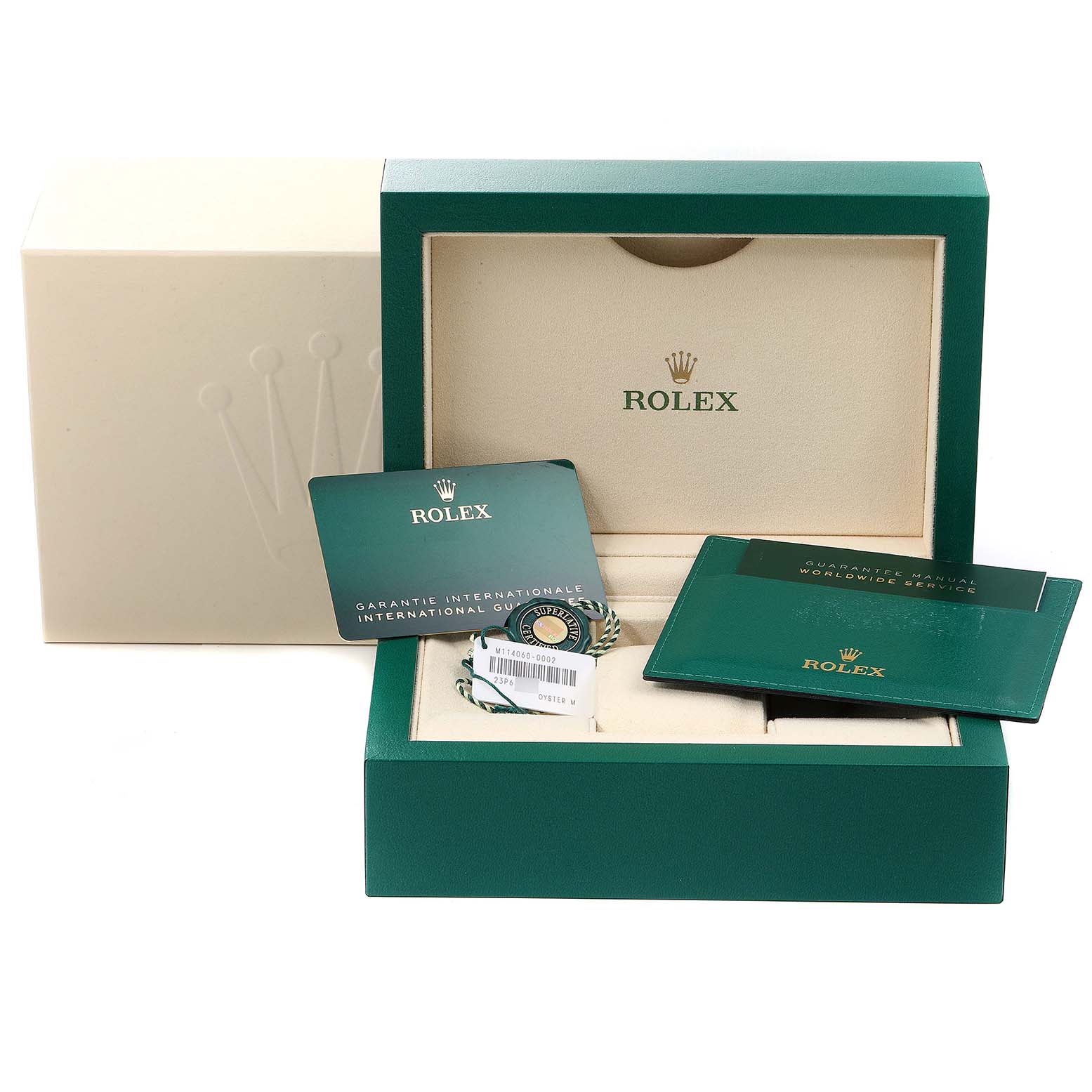 The image shows the packaging, international guarantee card, and manual for a Rolex Submariner 114060 Men
s Stainless Steel Black Dial 114060 Men
s Stainless Steel Black Dial watch.