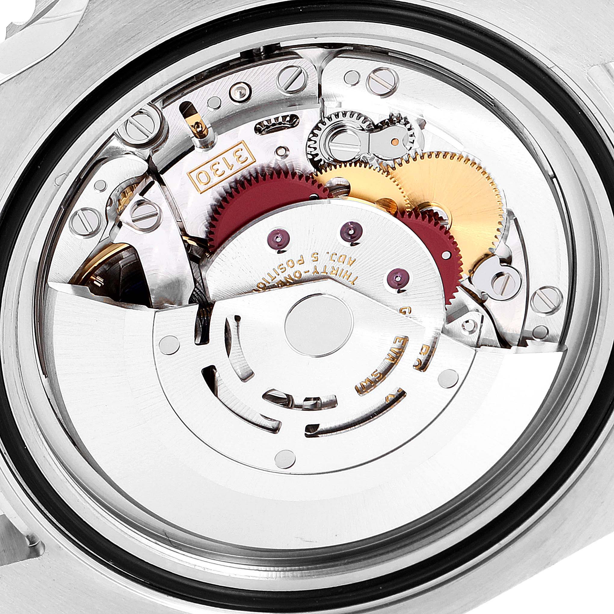 This image shows the intricate mechanism of the Rolex Submariner 114060 Men
s Stainless Steel Black Dial 114060 Men
s Stainless Steel Black Dial model from the back, highlighting its gears and movement parts.