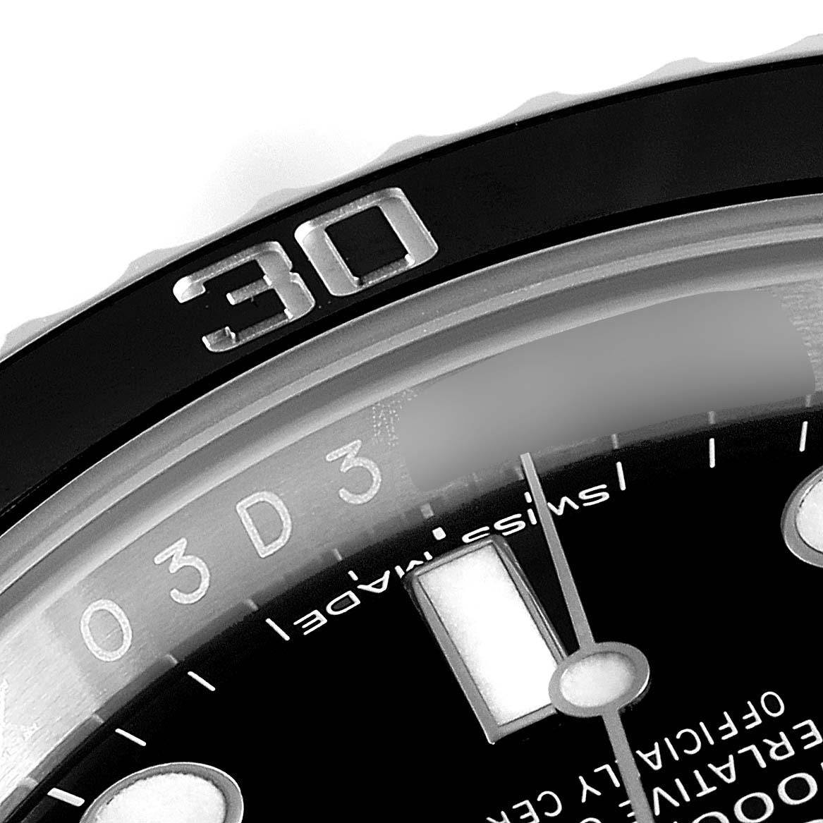 This close-up image of a Rolex Submariner 114060 Men
s Stainless Steel Black Dial 114060 Men
s Stainless Steel Black Dial watch shows the 
30
 mark on the bezel and part of the dial.