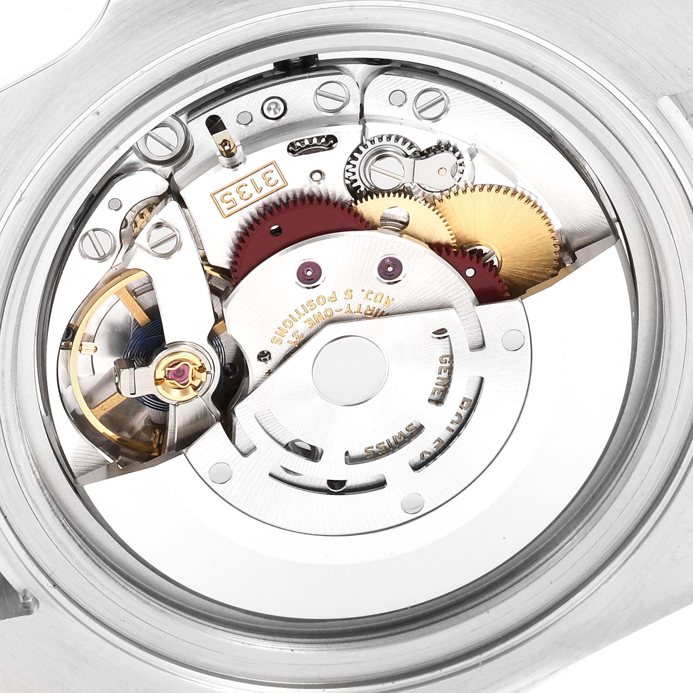 The image shows a close-up of the Rolex Submariner 116610 Men
s Stainless Steel Black Dial 116610 Men
s Stainless Steel Black Dial
s movement, displaying its gears and intricate inner components.