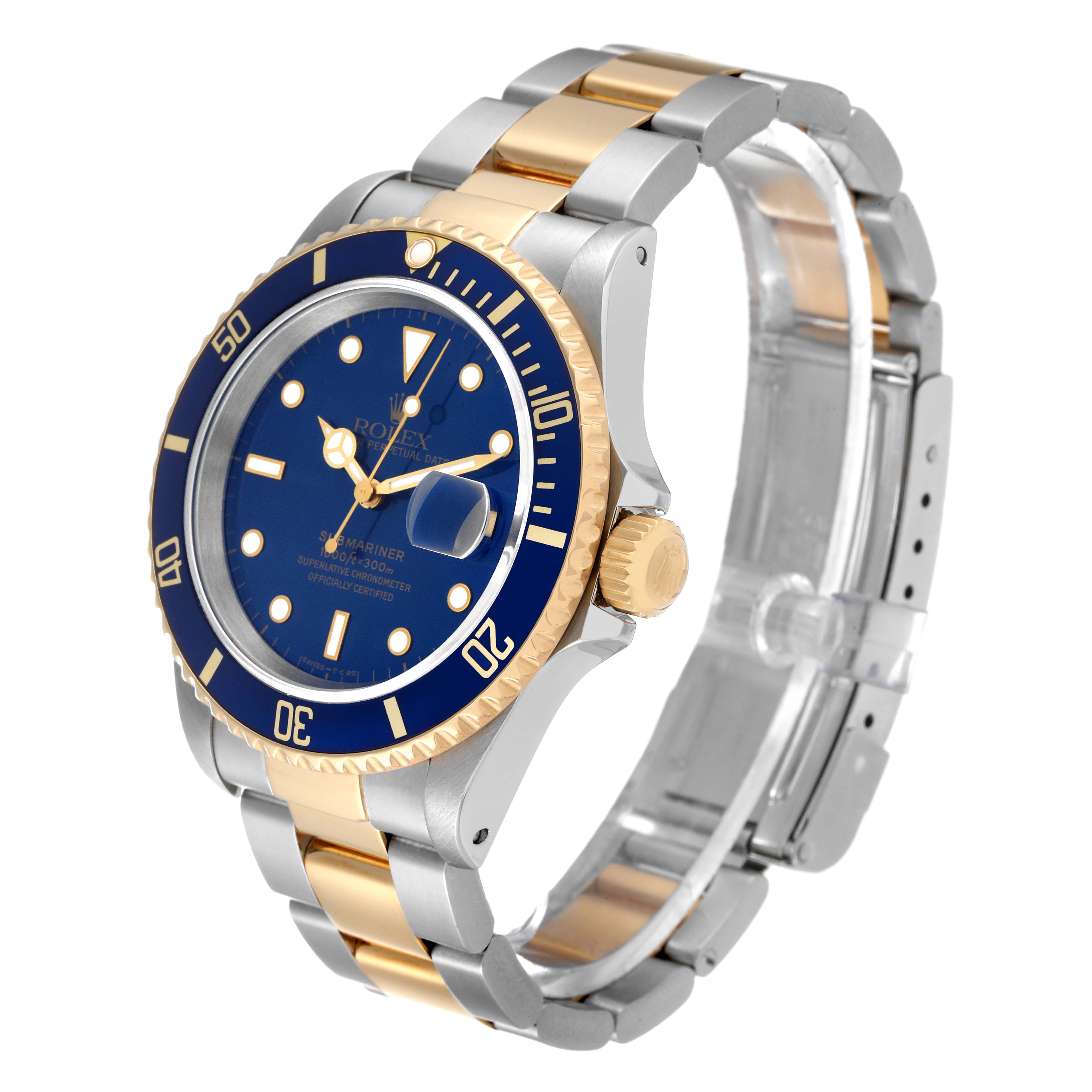 The image shows a Rolex Submariner 16613 Men's Steel and Gold (two tone) Blue Dial 16613 Men's Steel and Gold (two tone) Blue Dial watch at an oblique angle, highlighting its blue dial, bezel, and two-tone metal bracelet.