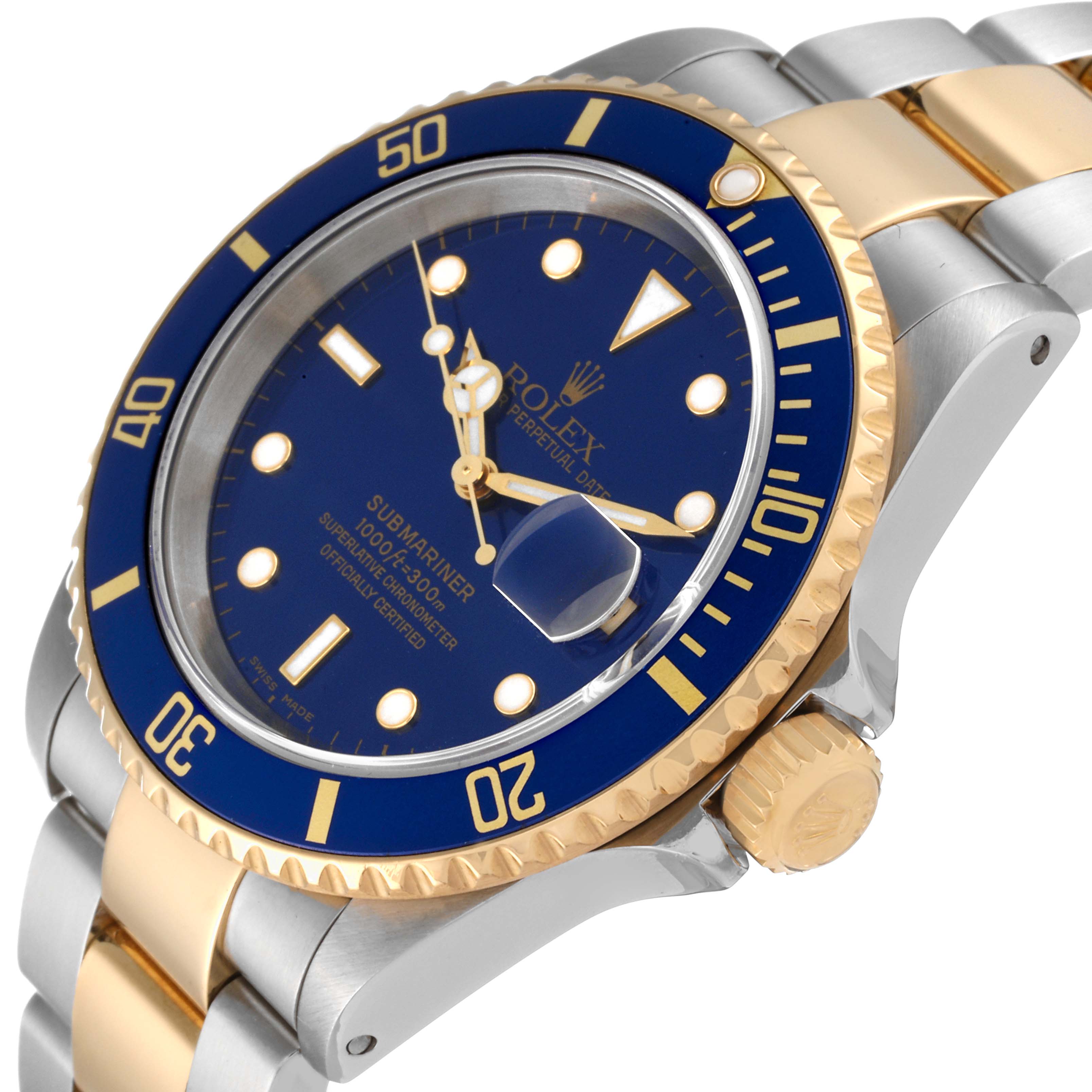 This image shows a Rolex Submariner 16613 Men's Steel and Gold (two tone) Blue Dial 16613 Men's Steel and Gold (two tone) Blue Dial watch from an angled side view, highlighting its blue dial, bezel, and two-tone bracelet.