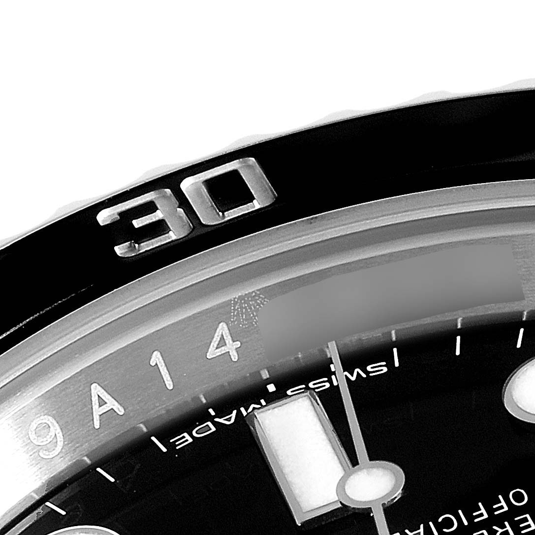 This close-up image shows the bezel, part of the dial, and markers of a Rolex Submariner 116610 Men
s Stainless Steel Black Dial 116610 Men
s Stainless Steel Black Dial watch.