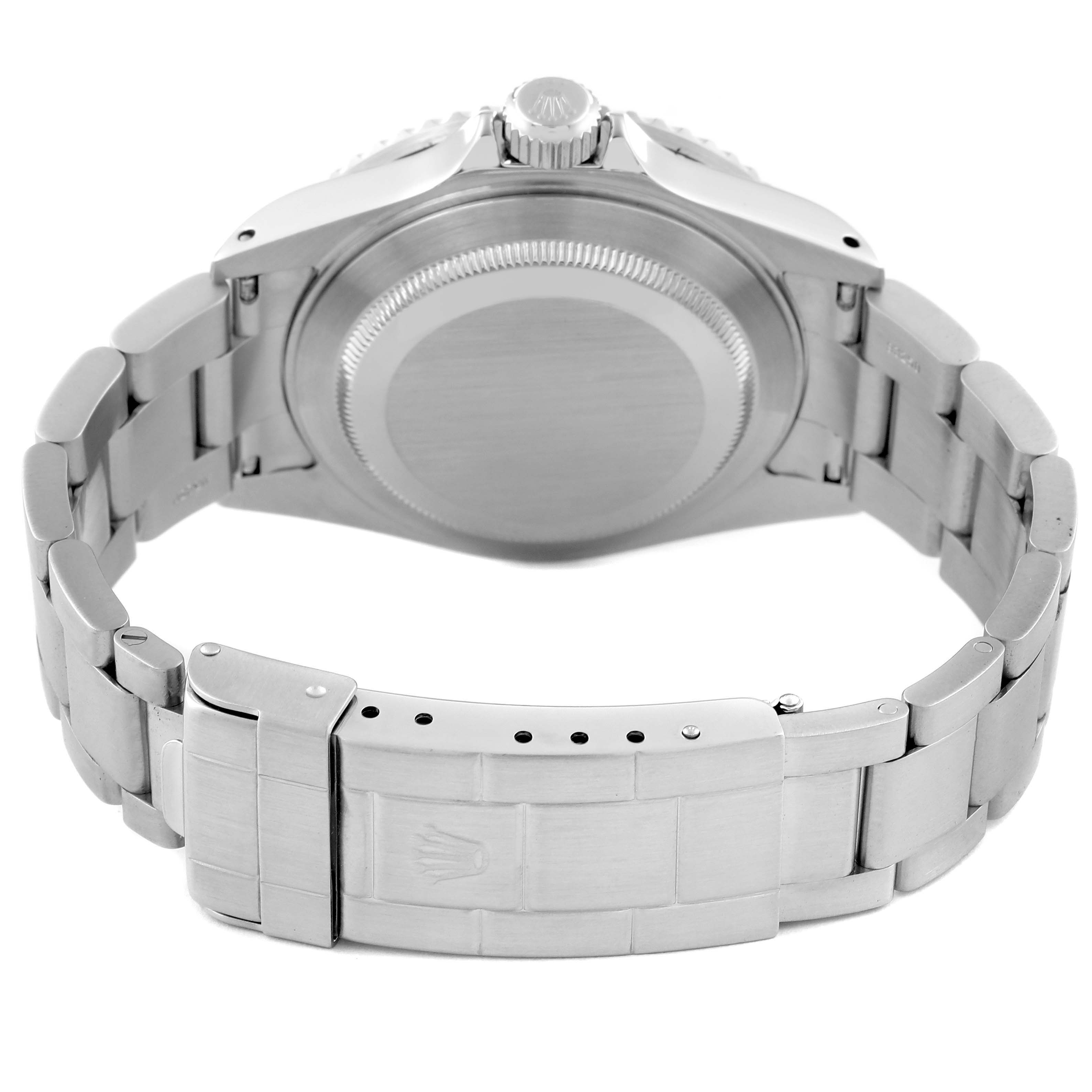 The image shows the back and bracelet of a Rolex Submariner 16610 Men
s Stainless Steel Black Dial 16610 Men
s Stainless Steel Black Dial watch, focusing on the case back and clasp.