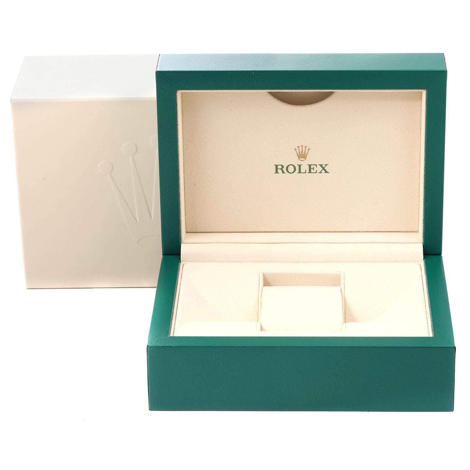 The image shows a green and cream-colored Rolex watch box, open and empty, with the Rolex logo inside.