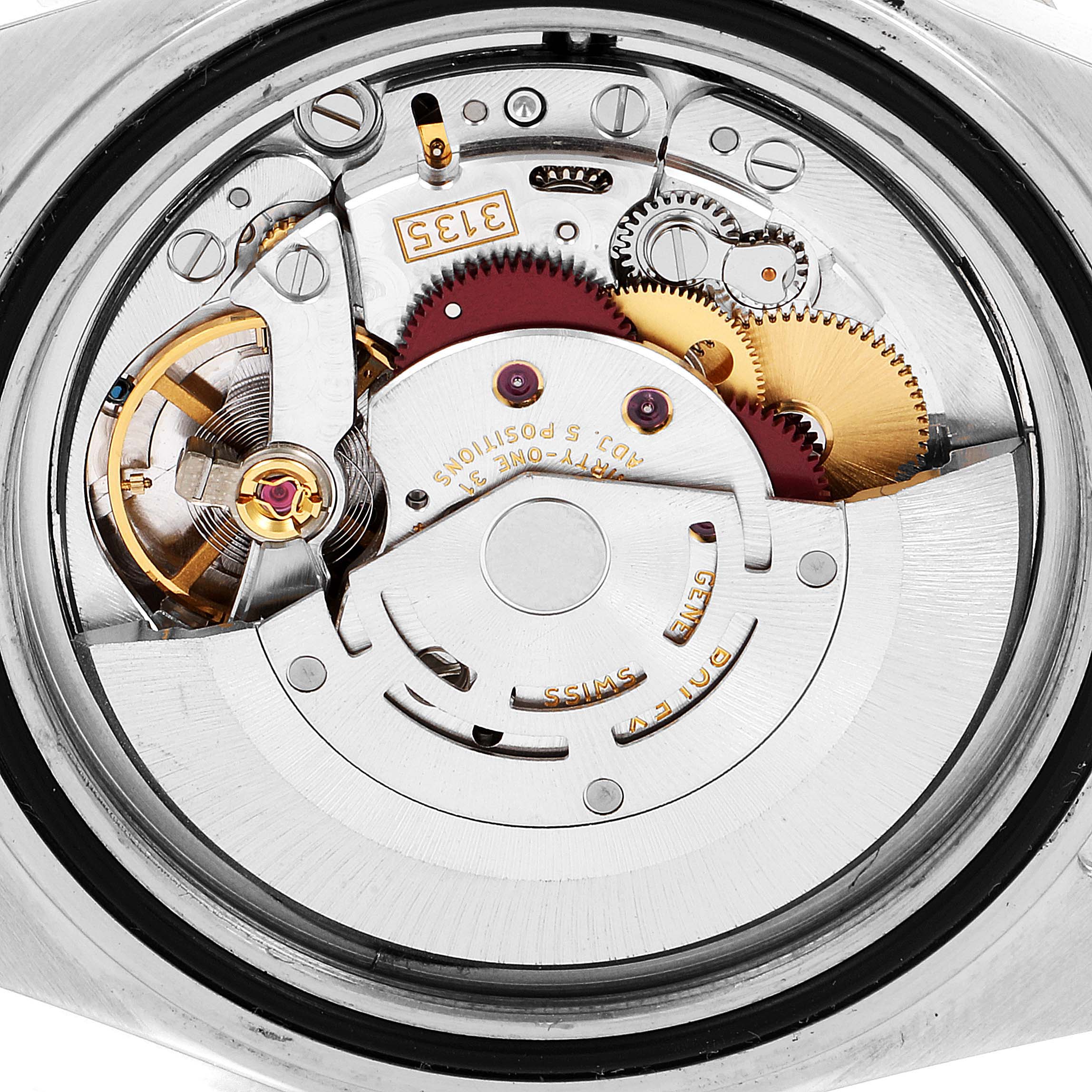 This image shows an internal view of the Rolex Submariner 16613 Men
s Steel and Gold (two tone) Champagne Dial 16613 Men
s Steel and Gold (two tone) Champagne Dial
s mechanical movement mechanism.