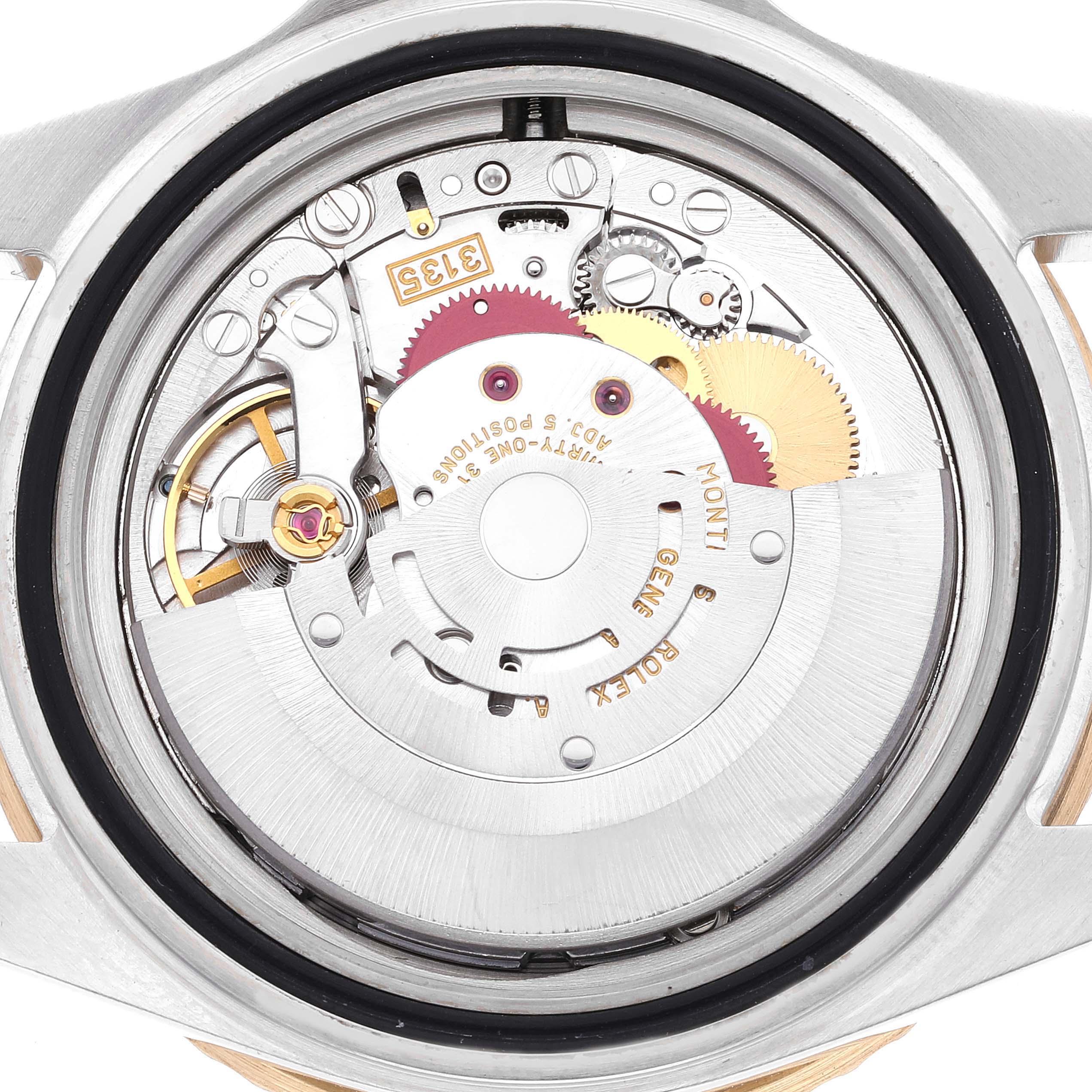 The image shows the back view of the Rolex Submariner 16613 Men's Steel and Gold (two tone) Black Dial 16613 Men's Steel and Gold (two tone) Black Dial watch, highlighting its internal mechanical movement.