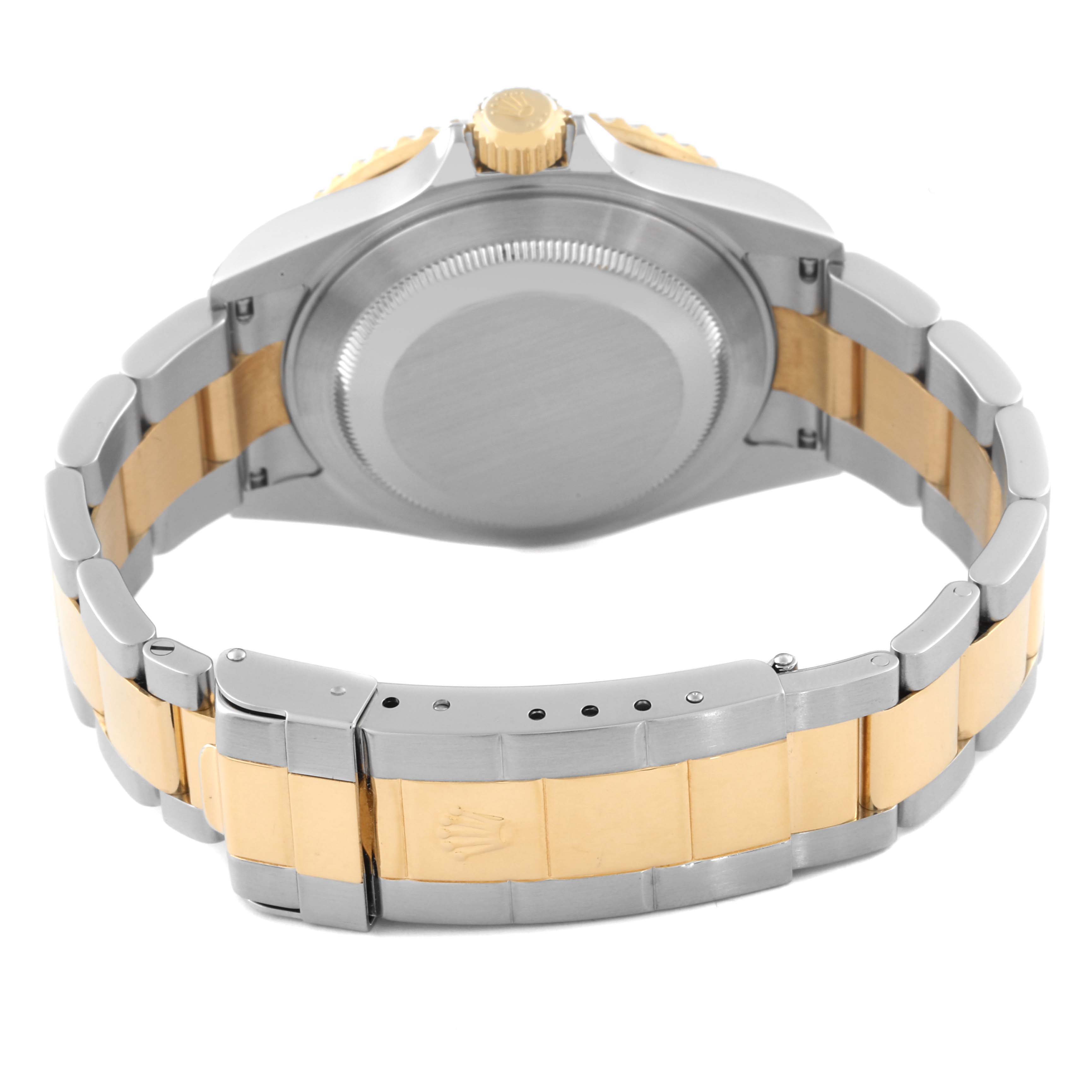 The Rolex Submariner 16613 Men's Steel and Gold (two tone) Black Dial 16613 Men's Steel and Gold (two tone) Black Dial is shown from the back, displaying its case, crown, and two-tone metal bracelet.