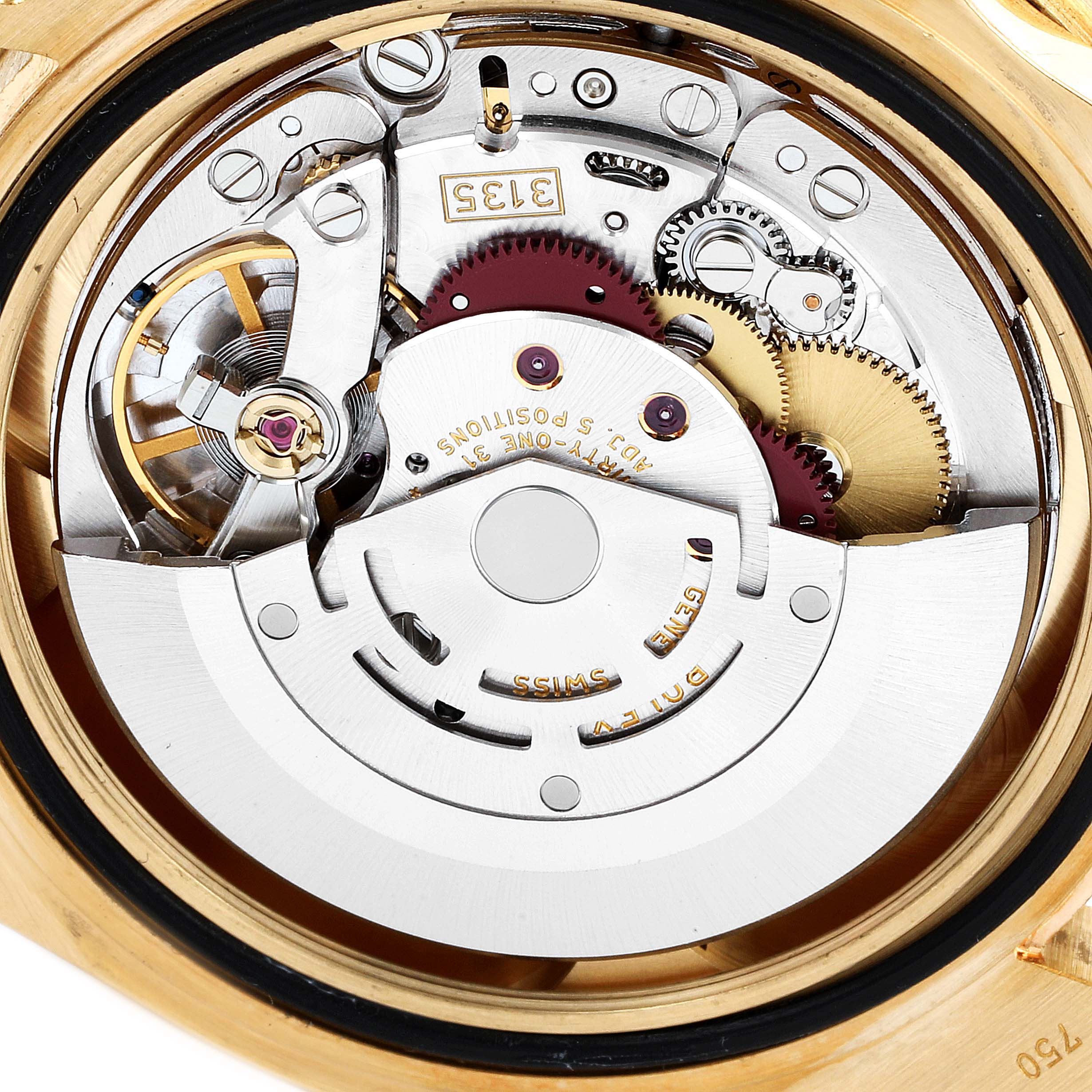 This image shows the internal mechanism of a Rolex Submariner 16618 Men's Yellow Gold Blue Dial 16618 Men's Yellow Gold Blue Dial watch from the back, revealing gears and the rotor.