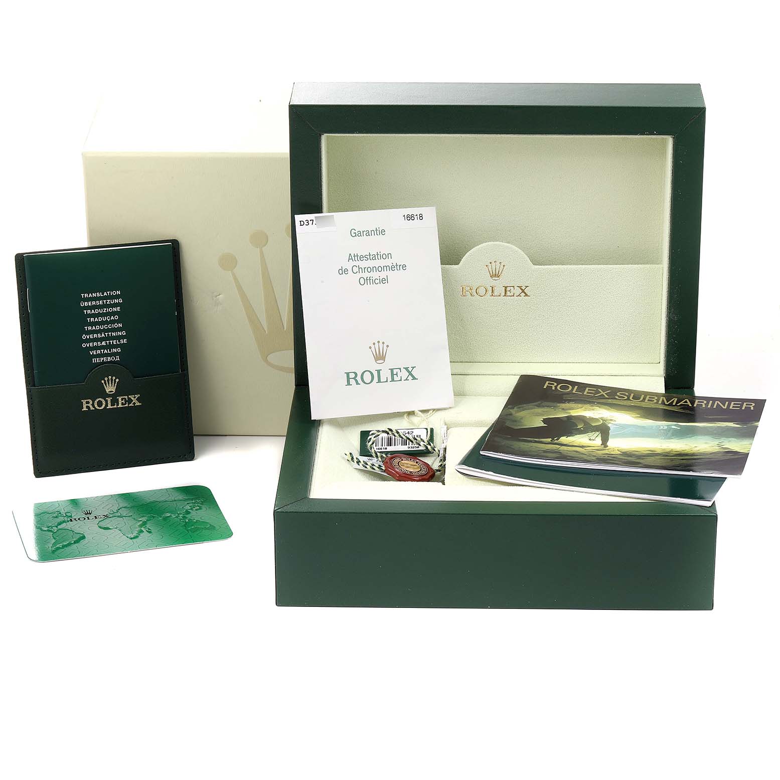 The image shows a Rolex Submariner 16618 Men's Yellow Gold Blue Dial 16618 Men's Yellow Gold Blue Dial watch set from an angled view, including the box, booklet, warranty card, and other accessories.