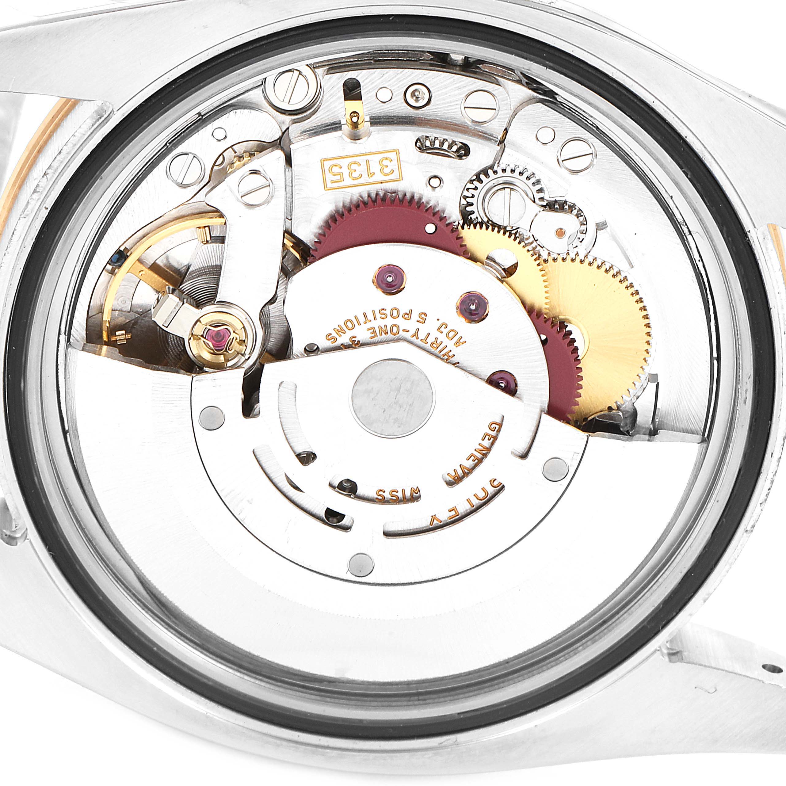 This is a close-up view of the Rolex Turn-o-Graph 116261 Men
s Steel and Gold (two tone) White Dial 116261 Men
s Steel and Gold (two tone) White Dial
s internal mechanical movement, showing various gears and components.