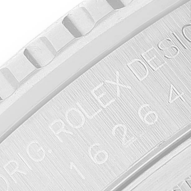 The image shows a close-up view of the edge and engraved text on the Turn-o-Graph model by Rolex.