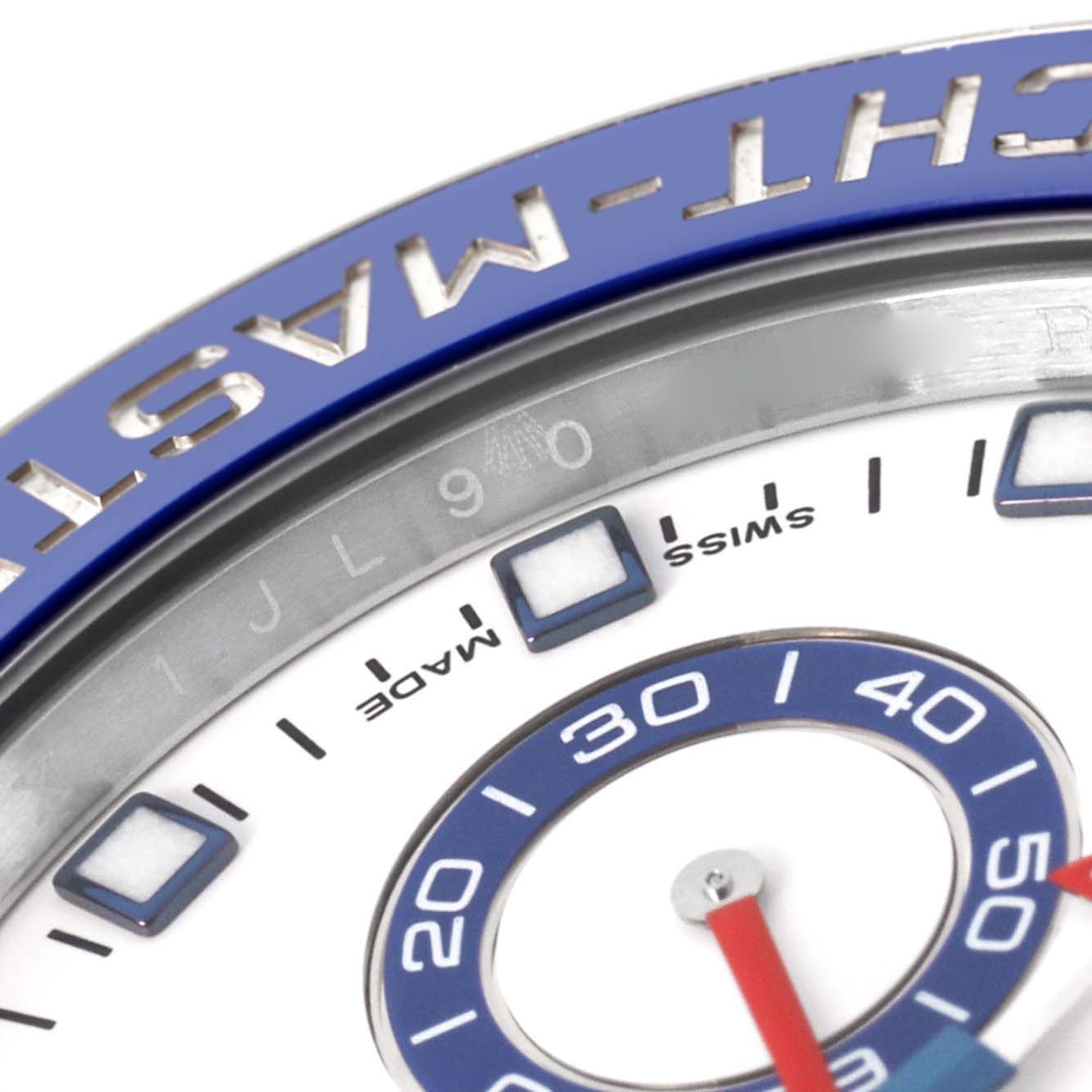 The image shows a close-up of the bezel and part of the dial of a Rolex Yacht-Master 116680 Men's Stainless Steel White Dial 116680 Men's Stainless Steel White Dial watch.