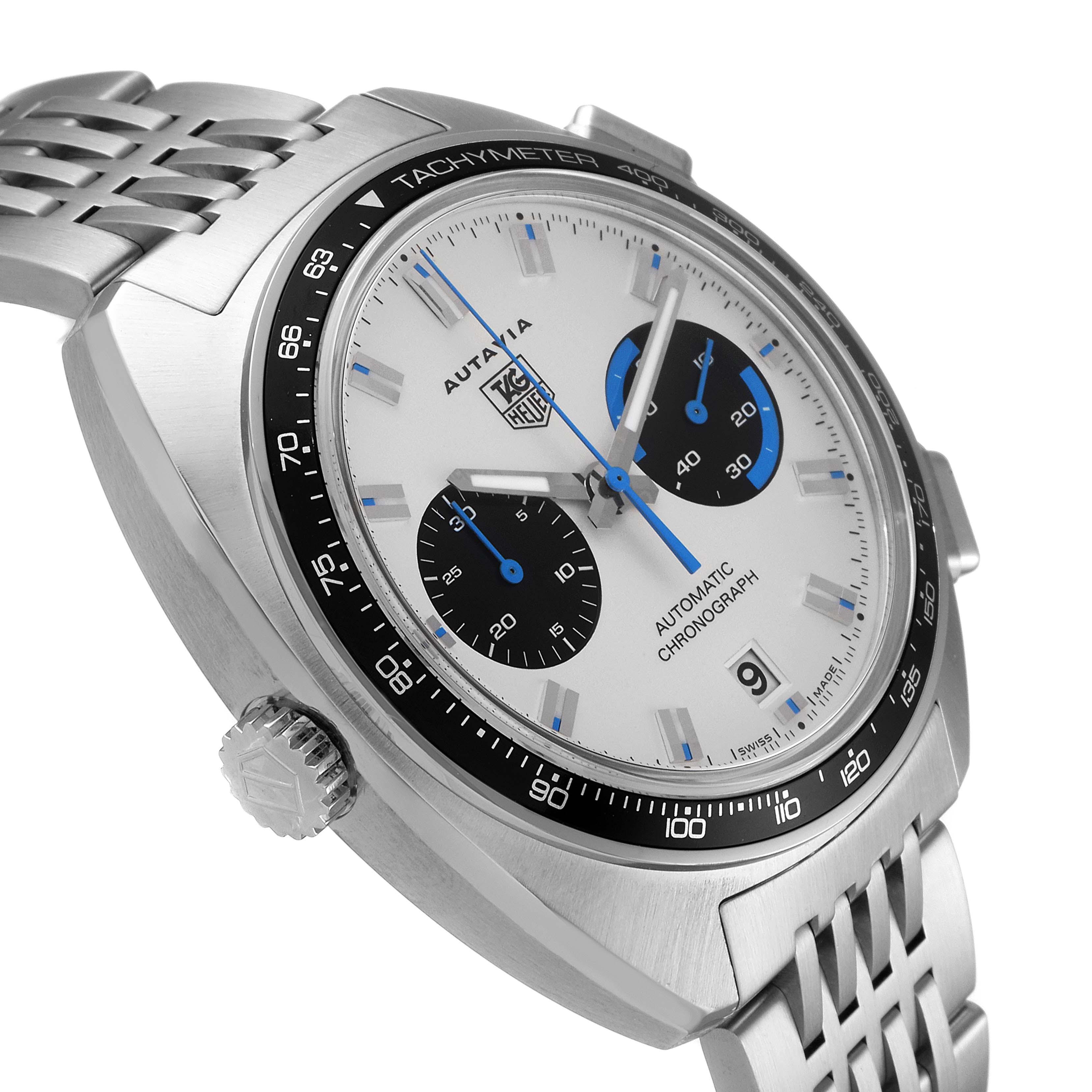 The image shows a close-up angled view of the Tag Heuer Autavia CY2110 Men's Stainless Steel White Dial CY2110 Men's Stainless Steel White Dial watch, highlighting the face, bezel, crown, and part of the metal bracelet.