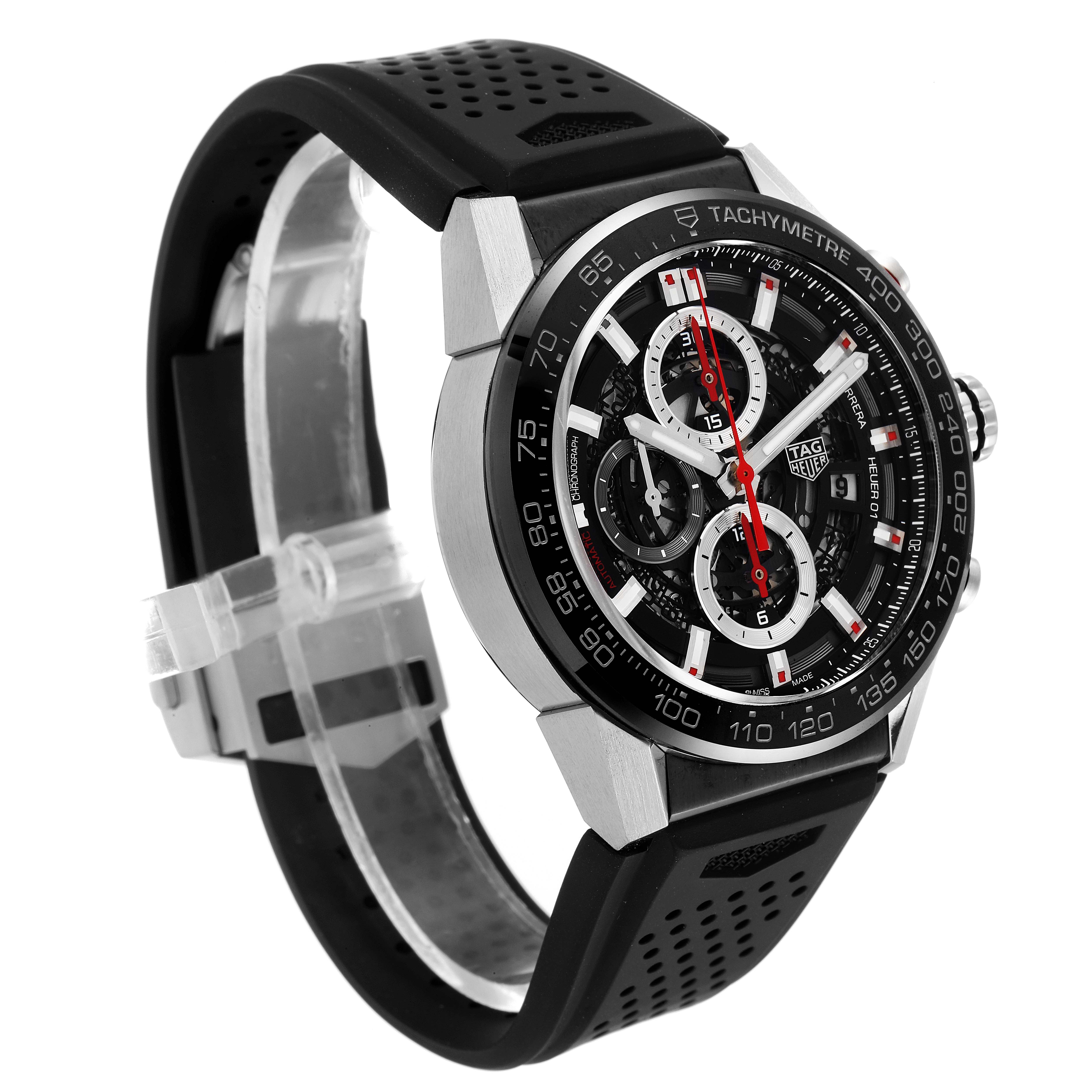 The image shows a side angle of a Tag Heuer Carrera CAR201V.BA0714 Men
s Stainless Steel Black Dial CAR201V.BA0714 Men
s Stainless Steel Black Dial watch, highlighting the dial, tachymeter, and black rubber strap.