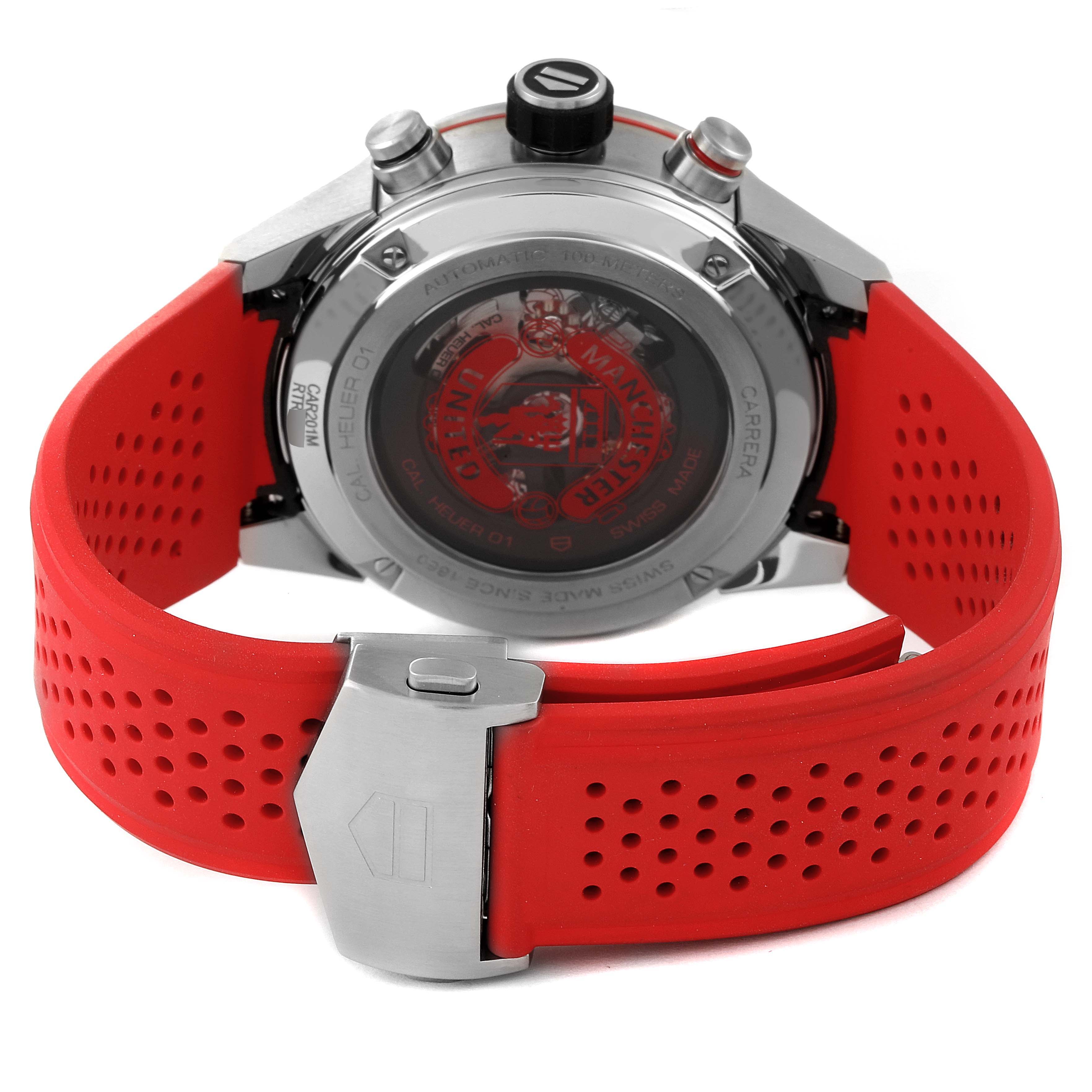 The image shows the back view of the Tag Heuer Carrera CAR201M.FT6156 Men's Stainless Steel Silver Dial CAR201M.FT6156 Men's Stainless Steel Silver Dial watch with a red perforated strap and stainless steel clasp.