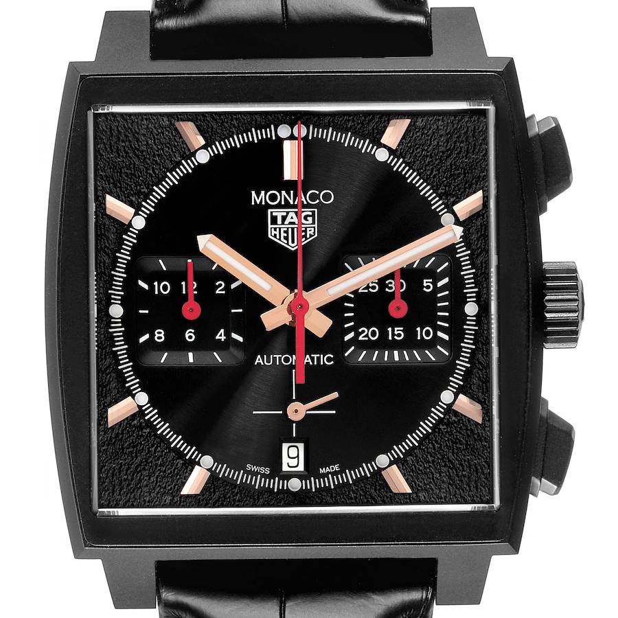 The image shows a front view of the Tag Heuer Monaco watch, displaying its square face, subdials, and crown on the side.